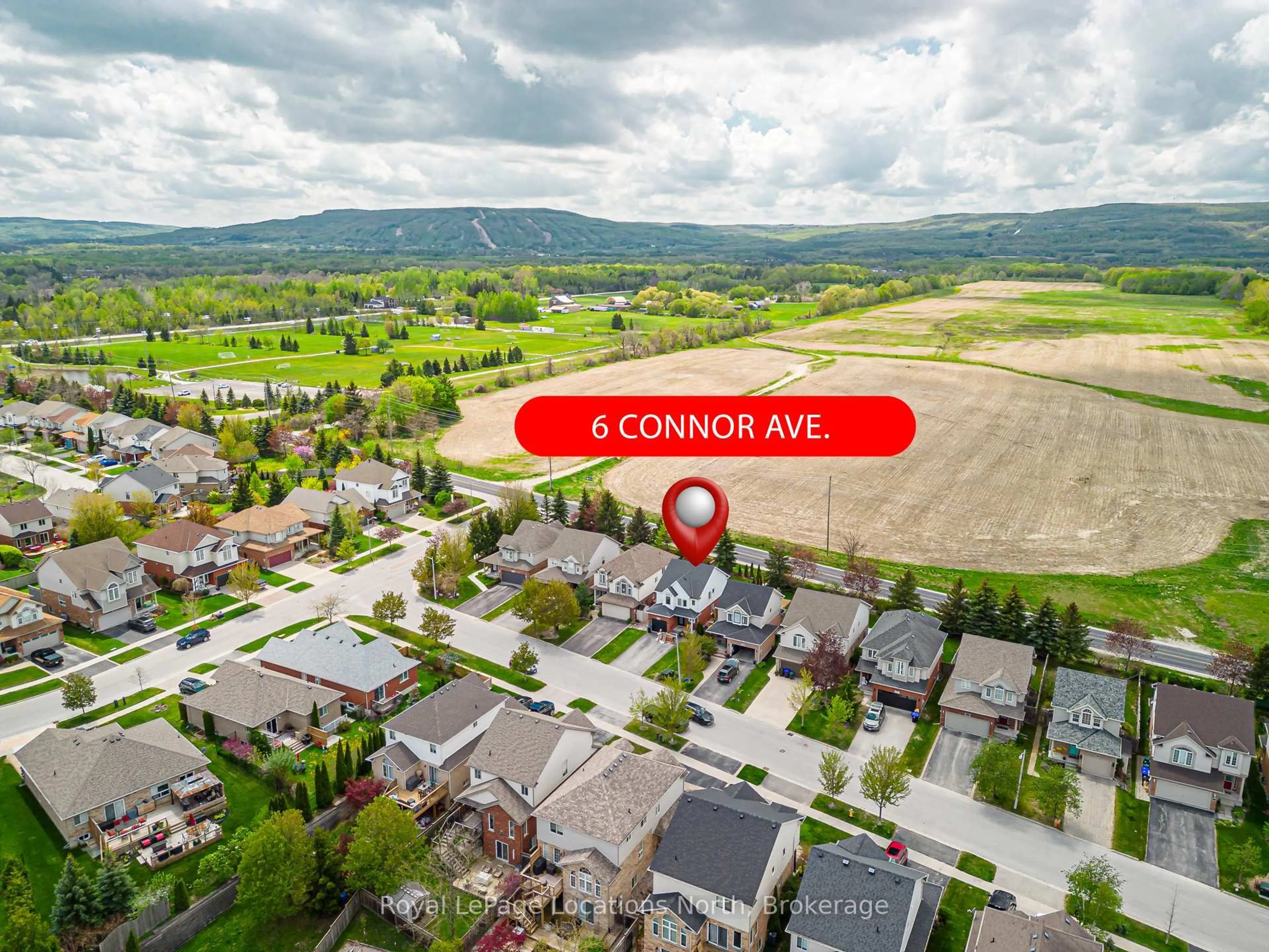 A pic from outside/outdoor area/front of a property/back of a property/a pic from drone, mountain view for 6 Connor Ave, Collingwood Ontario L9Y 5H4