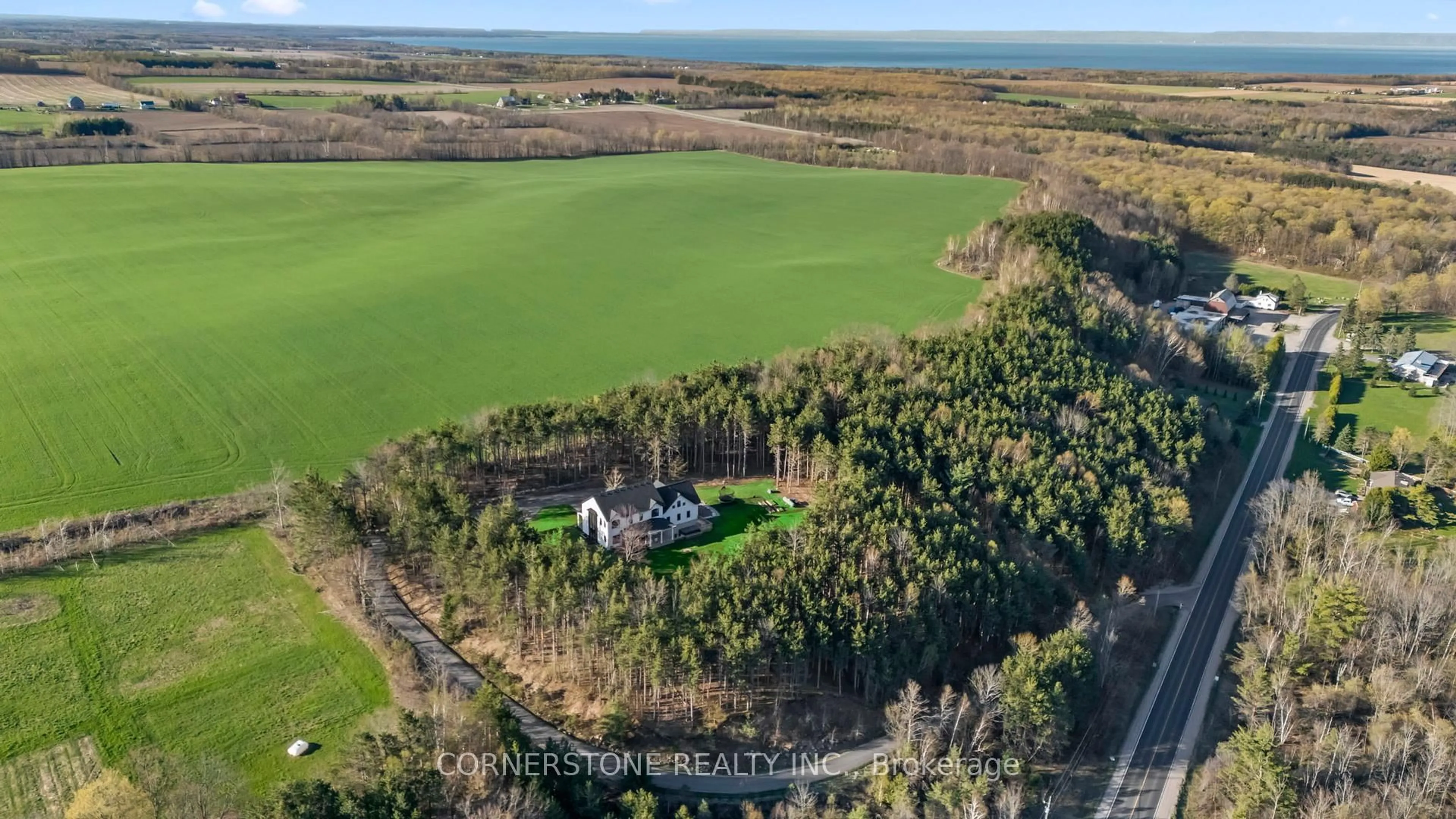 A pic from outside/outdoor area/front of a property/back of a property/a pic from drone, water/lake/river/ocean view for 115 Rue Lafontaine Rd, Tiny Ontario L9M 0S1