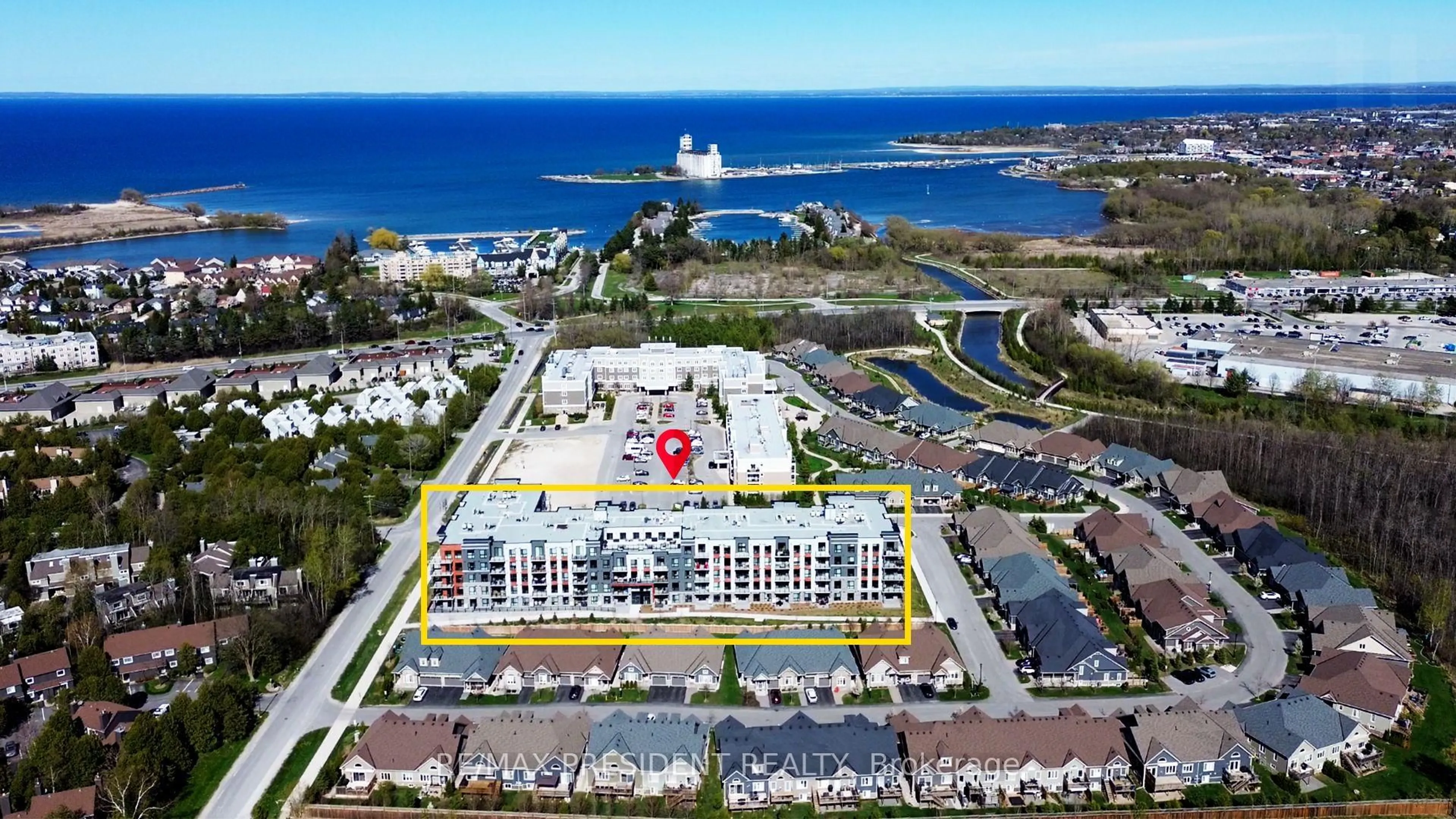 A pic from outside/outdoor area/front of a property/back of a property/a pic from drone, water/lake/river/ocean view for 4 Kimberly Lane #403, Collingwood Ontario L9Y 5B4