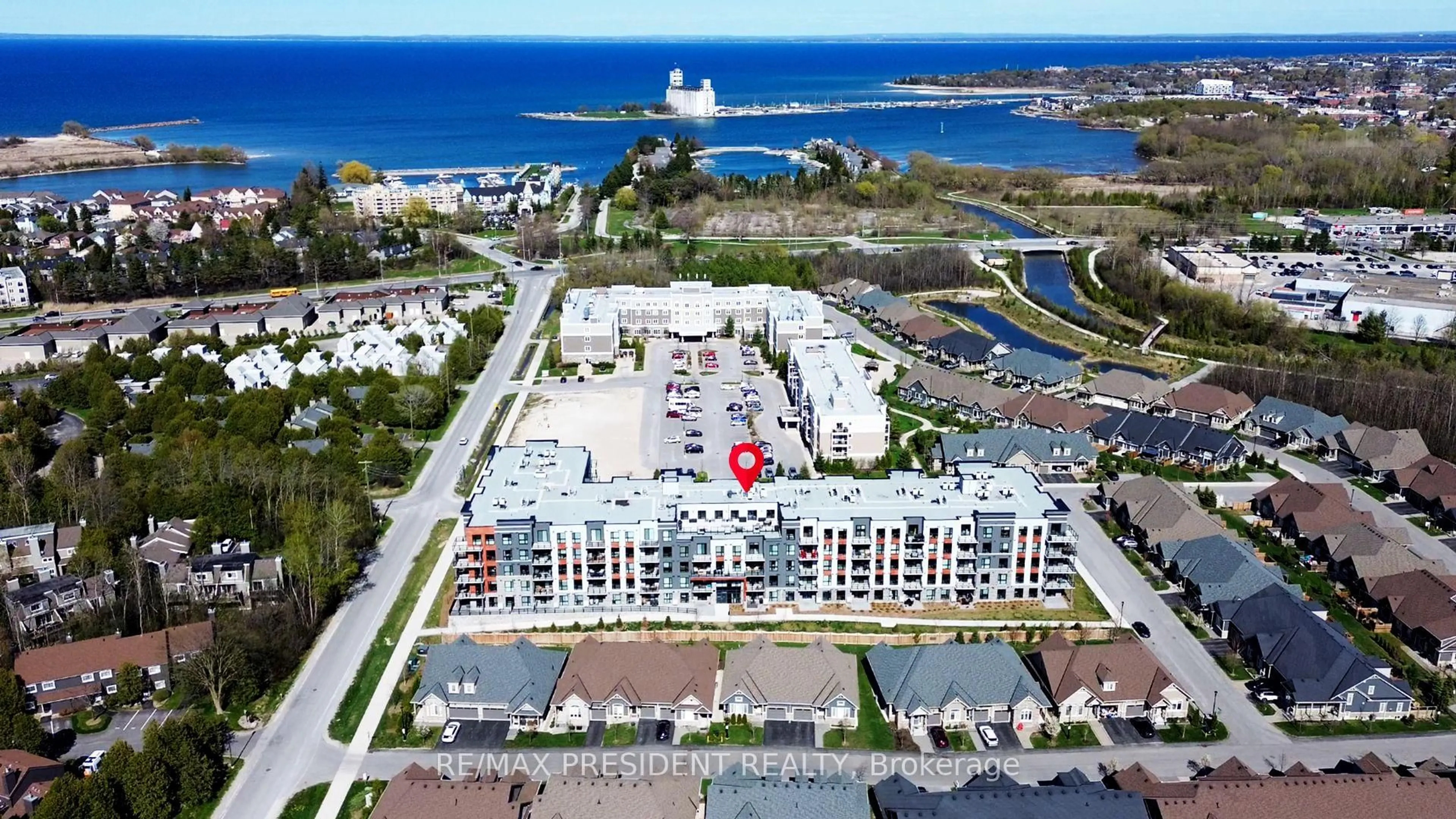 A pic from outside/outdoor area/front of a property/back of a property/a pic from drone, water/lake/river/ocean view for 4 Kimberly Lane #403, Collingwood Ontario L9Y 5B4
