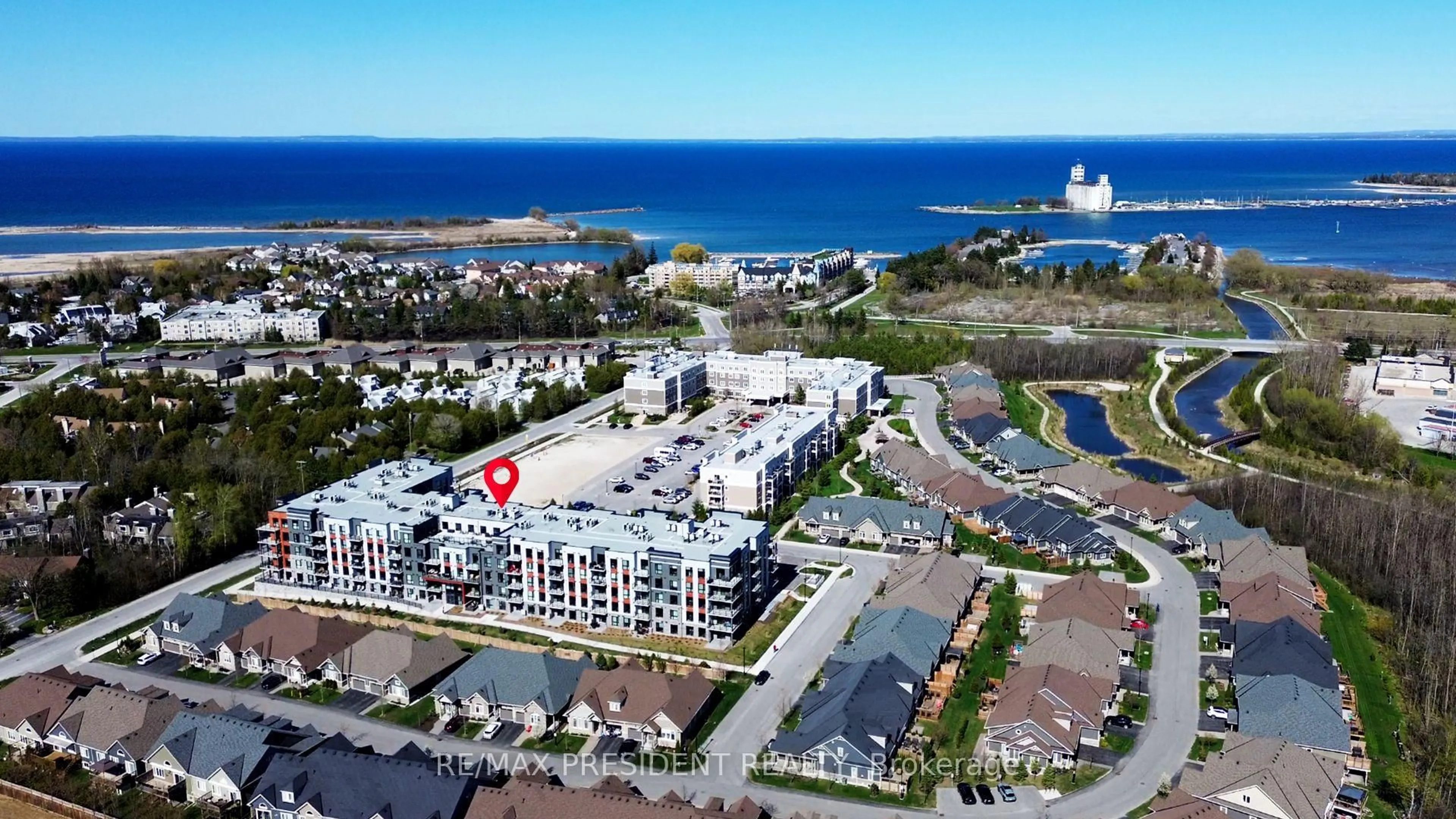 A pic from outside/outdoor area/front of a property/back of a property/a pic from drone, water/lake/river/ocean view for 4 Kimberly Lane #403, Collingwood Ontario L9Y 5B4
