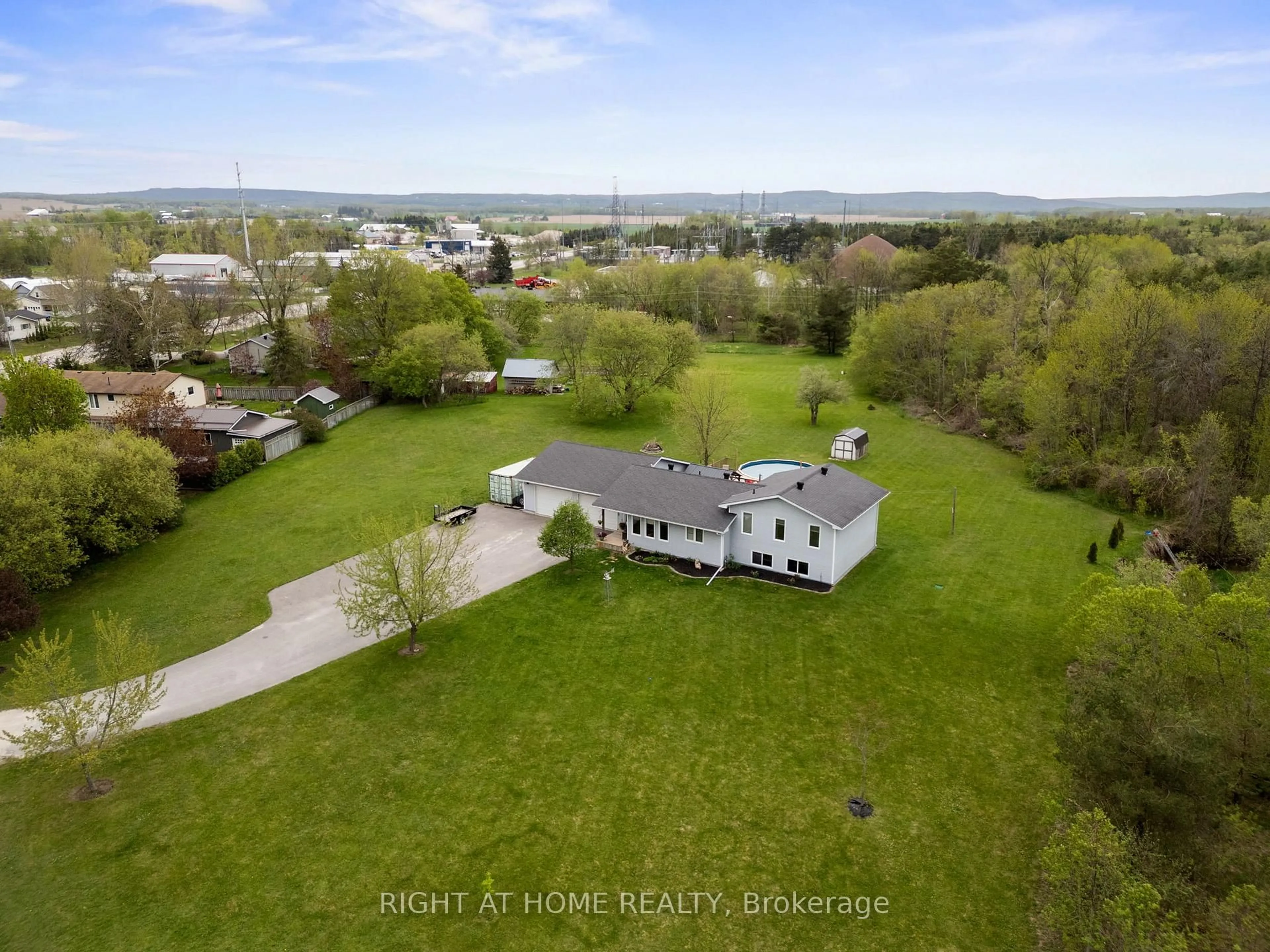 A pic from outside/outdoor area/front of a property/back of a property/a pic from drone, unknown for 7544 County Road 91 Rd, Clearview Ontario L0M 1S0