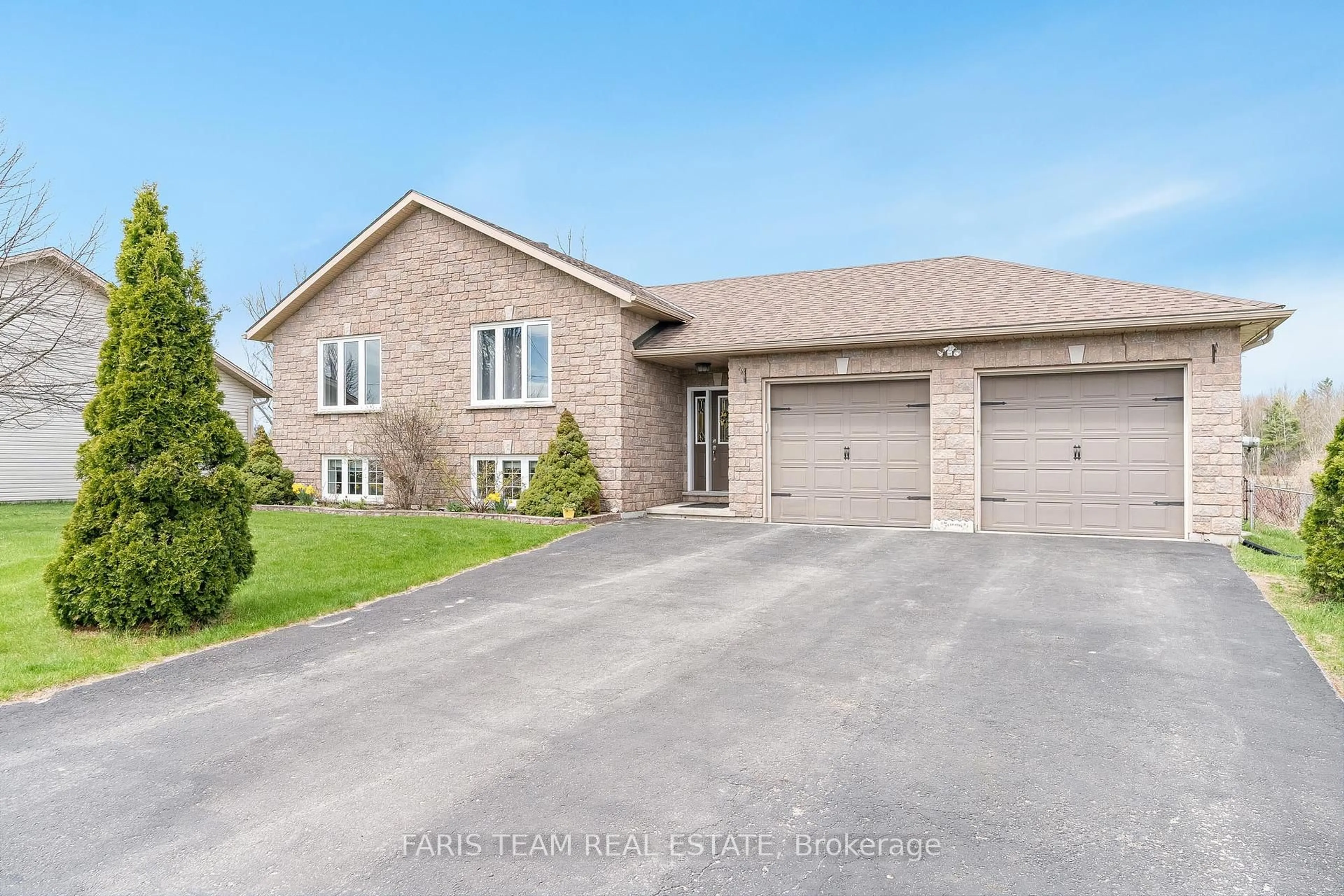 Home with brick exterior material, street for 1032 Flos Road 4 N/A, Springwater Ontario L0L 0A9