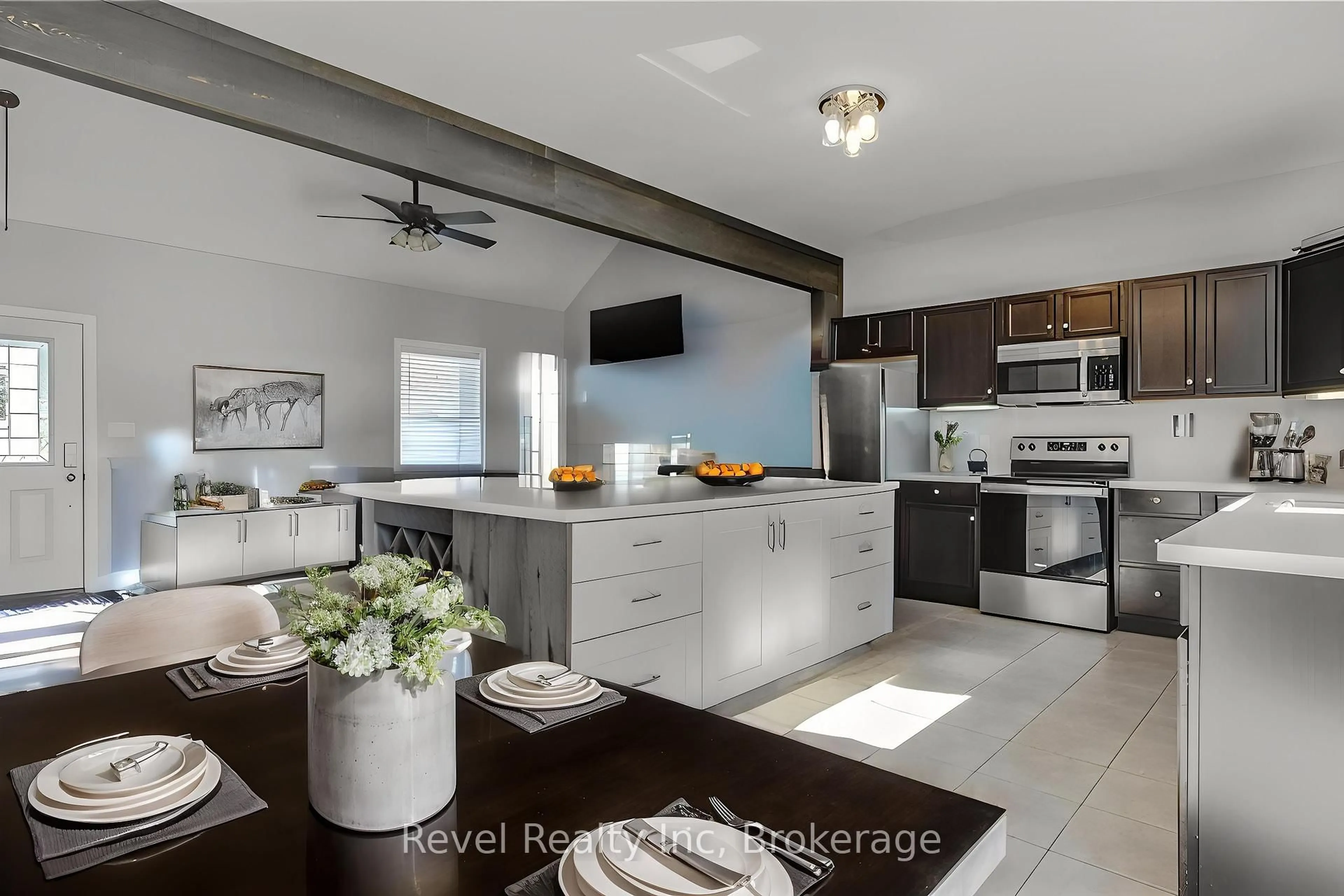 Open concept kitchen, ceramic/tile floor for 23 RUE HELENE N/A, Tiny Ontario L9M 0H1