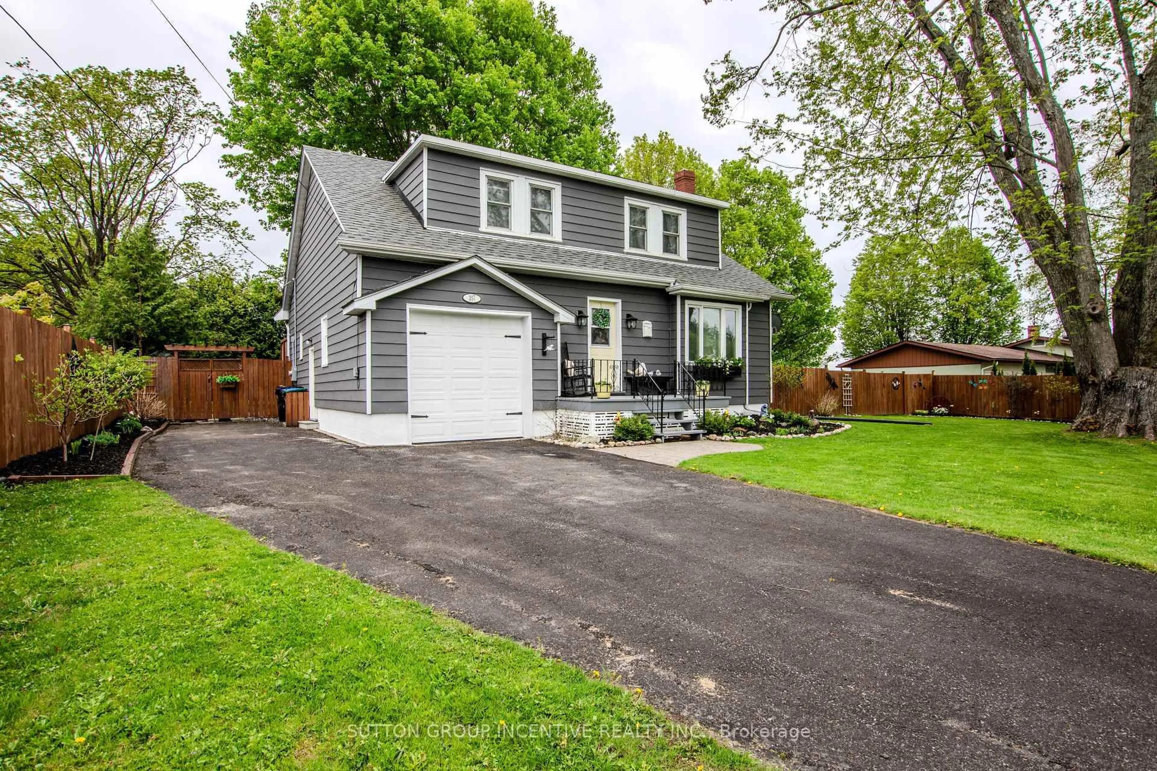 Home with vinyl exterior material, street for 357 Lafontaine Rd, Tiny Ontario L9M 0H1