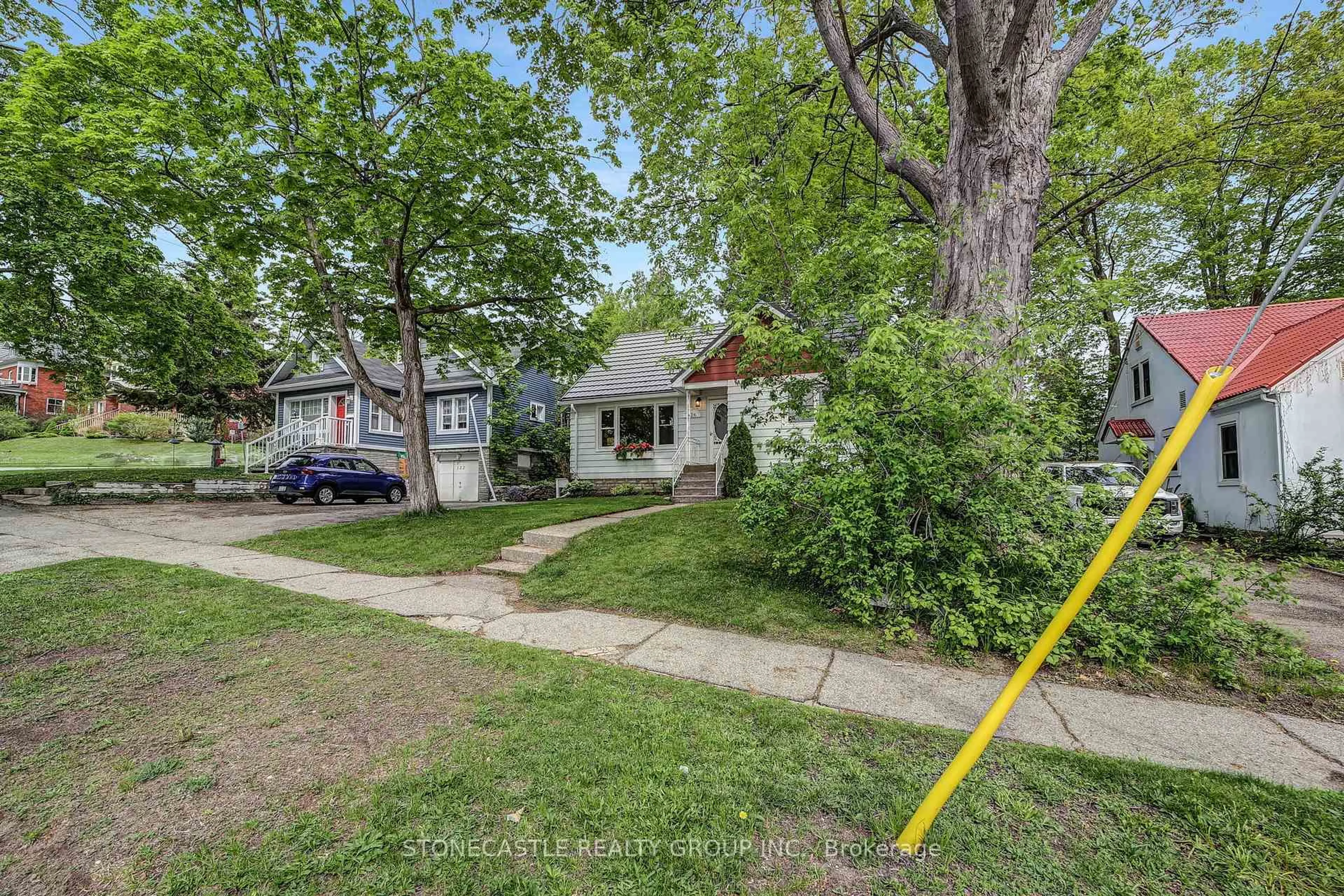 A pic from outside/outdoor area/front of a property/back of a property/a pic from drone, street for 126 Brant St, Orillia Ontario L3V 1Z4