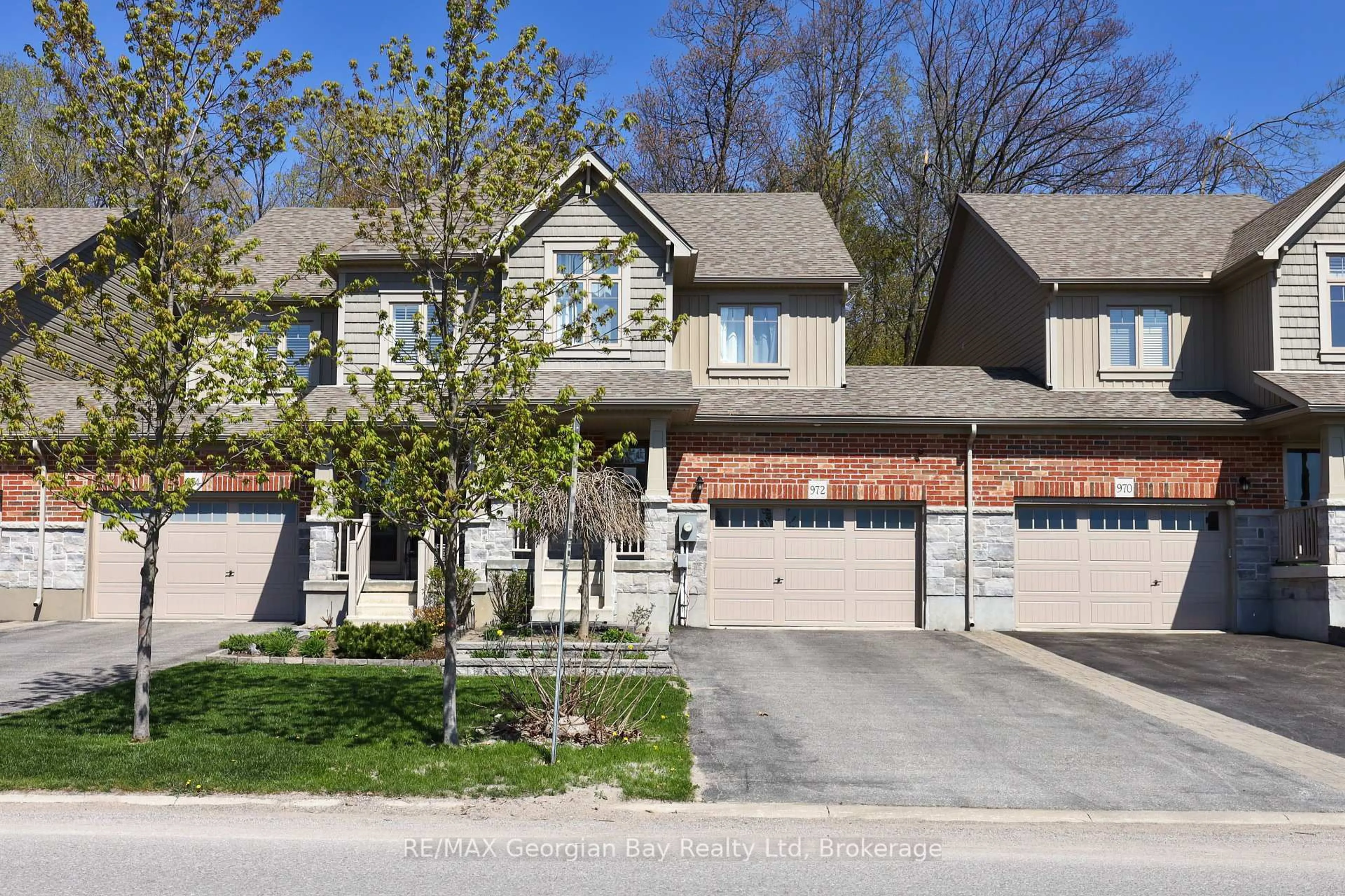 Home with brick exterior material, street for 972 Cook Dr, Midland Ontario L4R 0E4