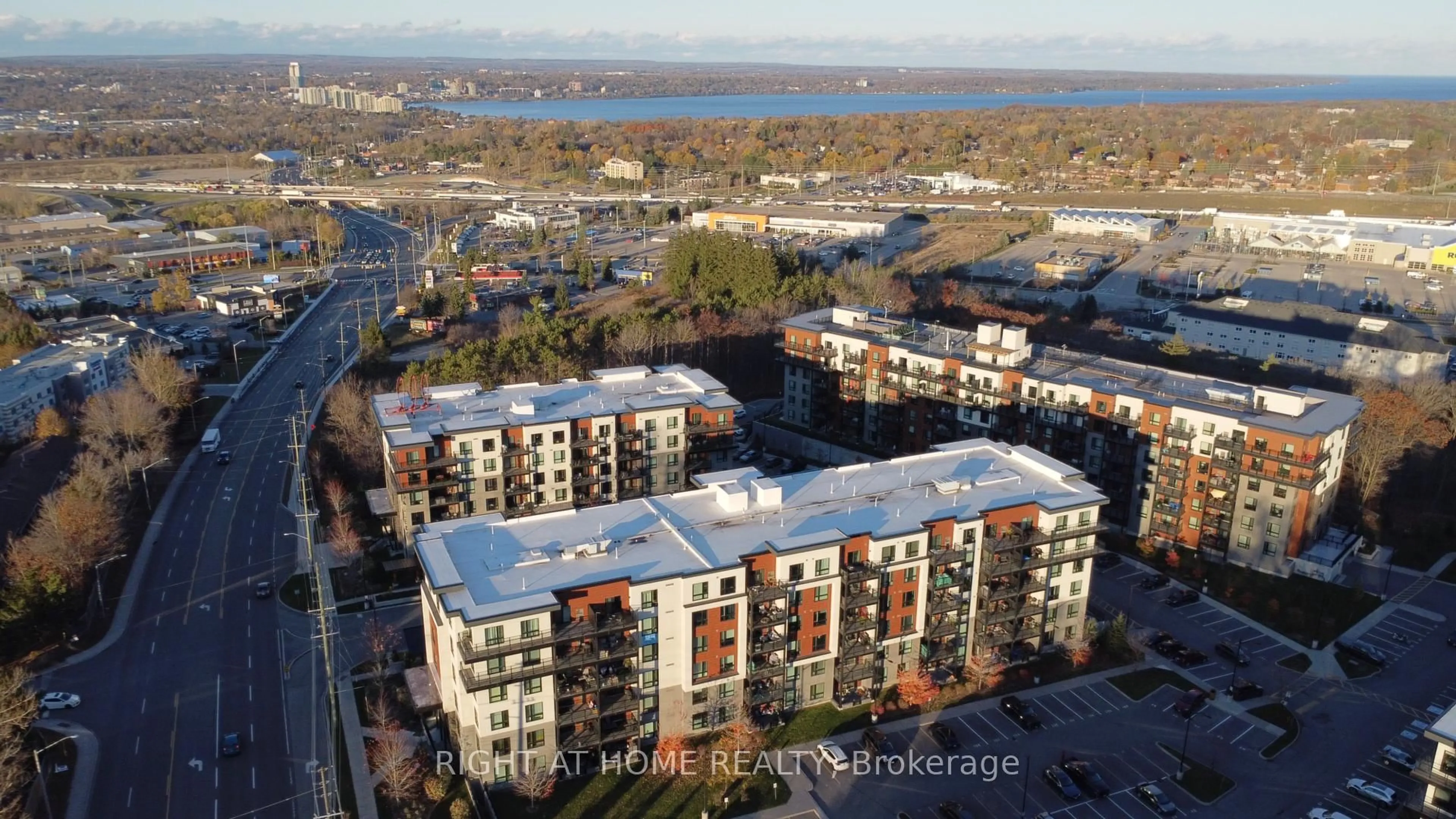 A pic from outside/outdoor area/front of a property/back of a property/a pic from drone, city buildings view from balcony for 302 Essa Rd #213, Barrie Ontario L9J 0H3