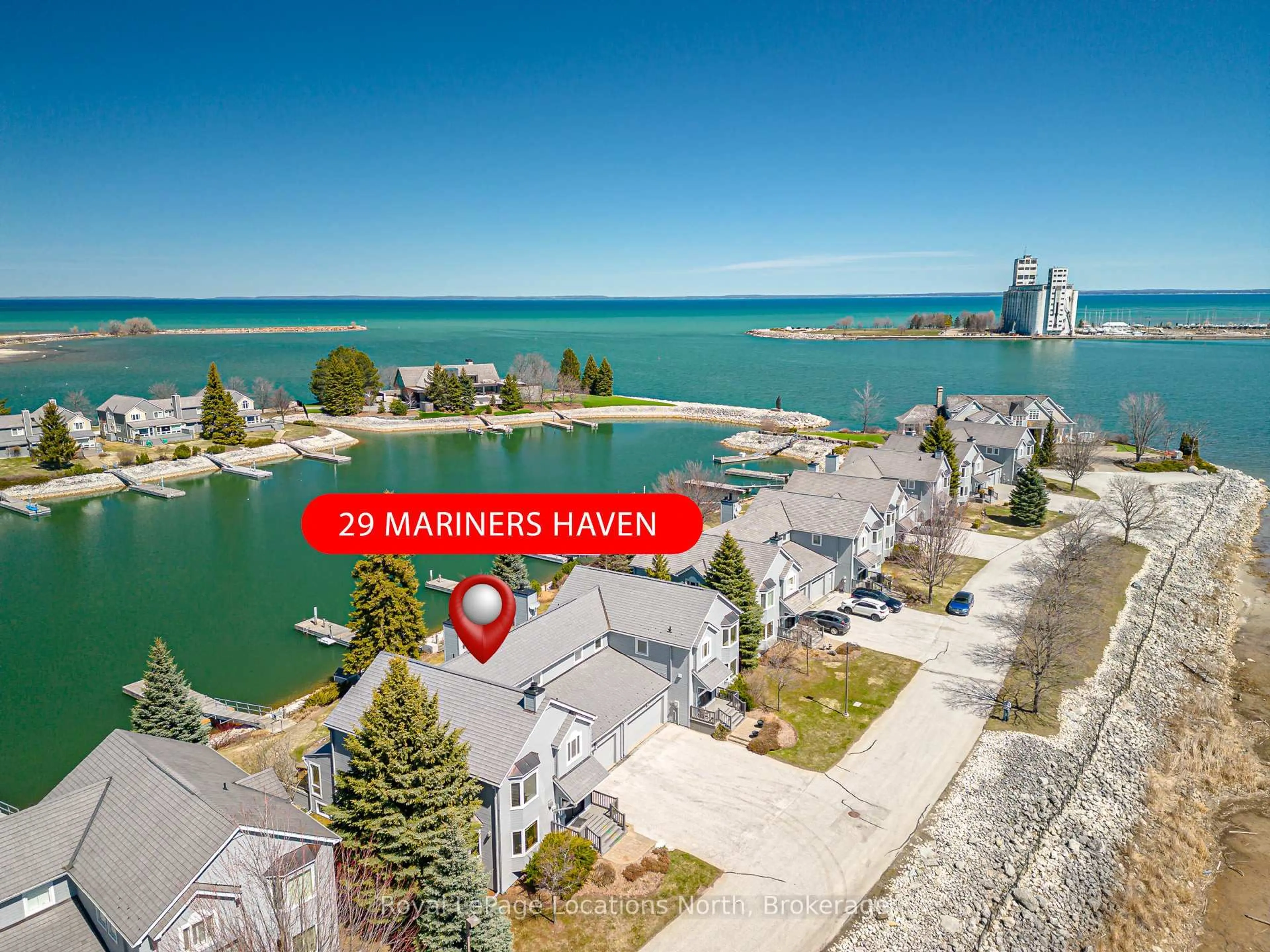 A pic from outside/outdoor area/front of a property/back of a property/a pic from drone, water/lake/river/ocean view for 29 Mariners Haven, Collingwood Ontario L9Y 5B5