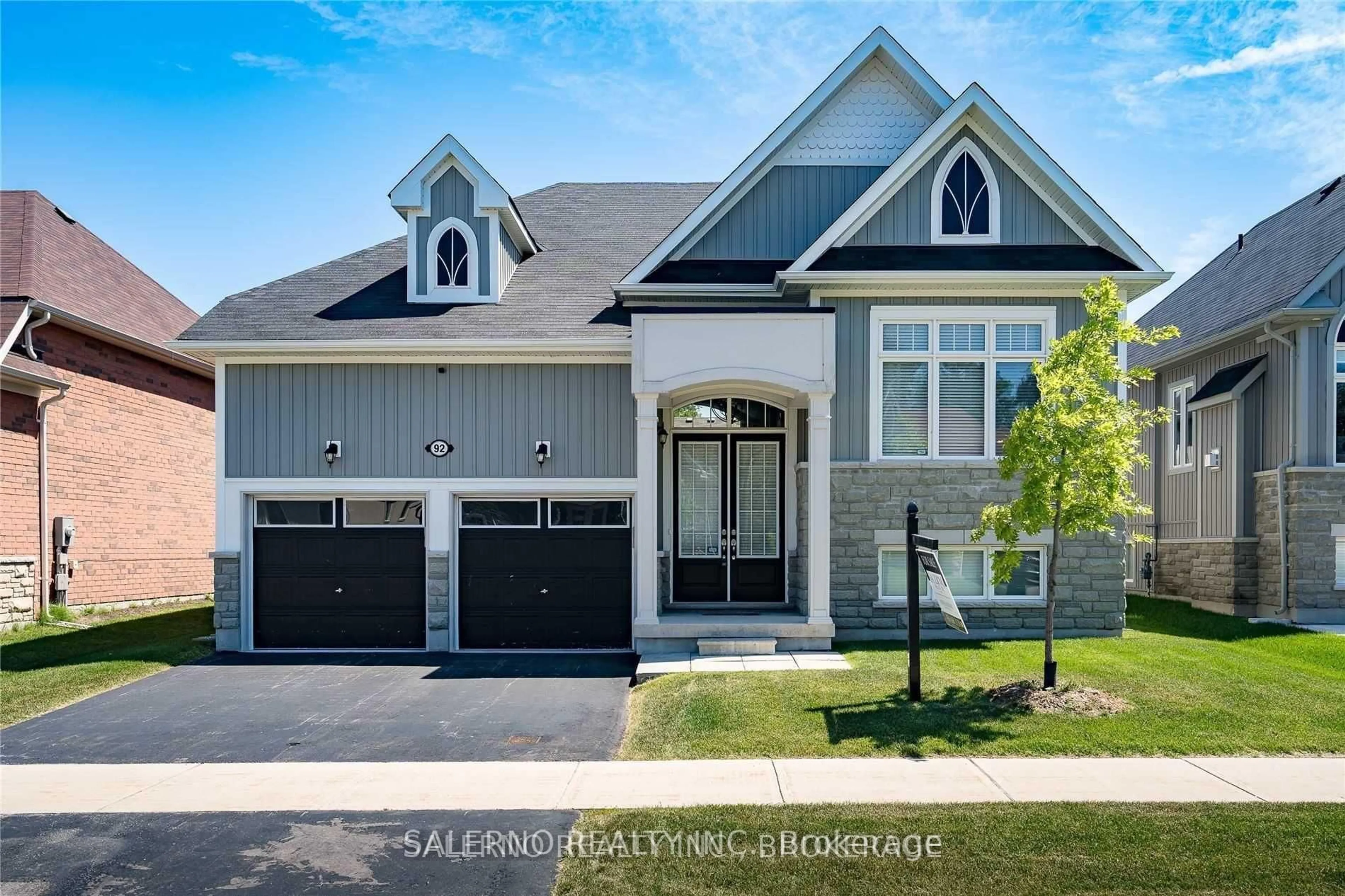 Home with brick exterior material, street for 92 Allegra St, Wasaga Beach Ontario L9Z 0H2