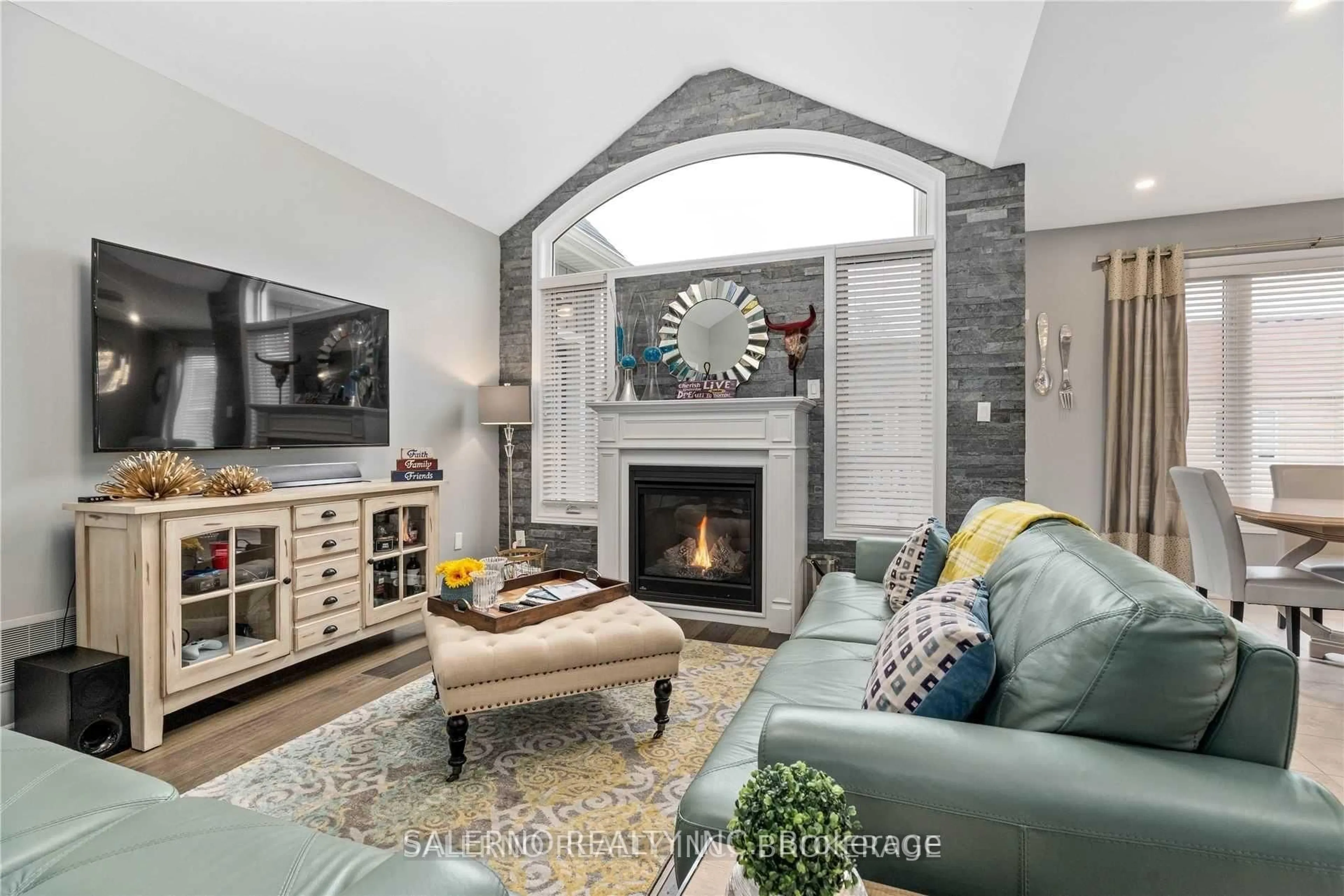 Living room with furniture, ceramic/tile floor for 92 Allegra St, Wasaga Beach Ontario L9Z 0H2