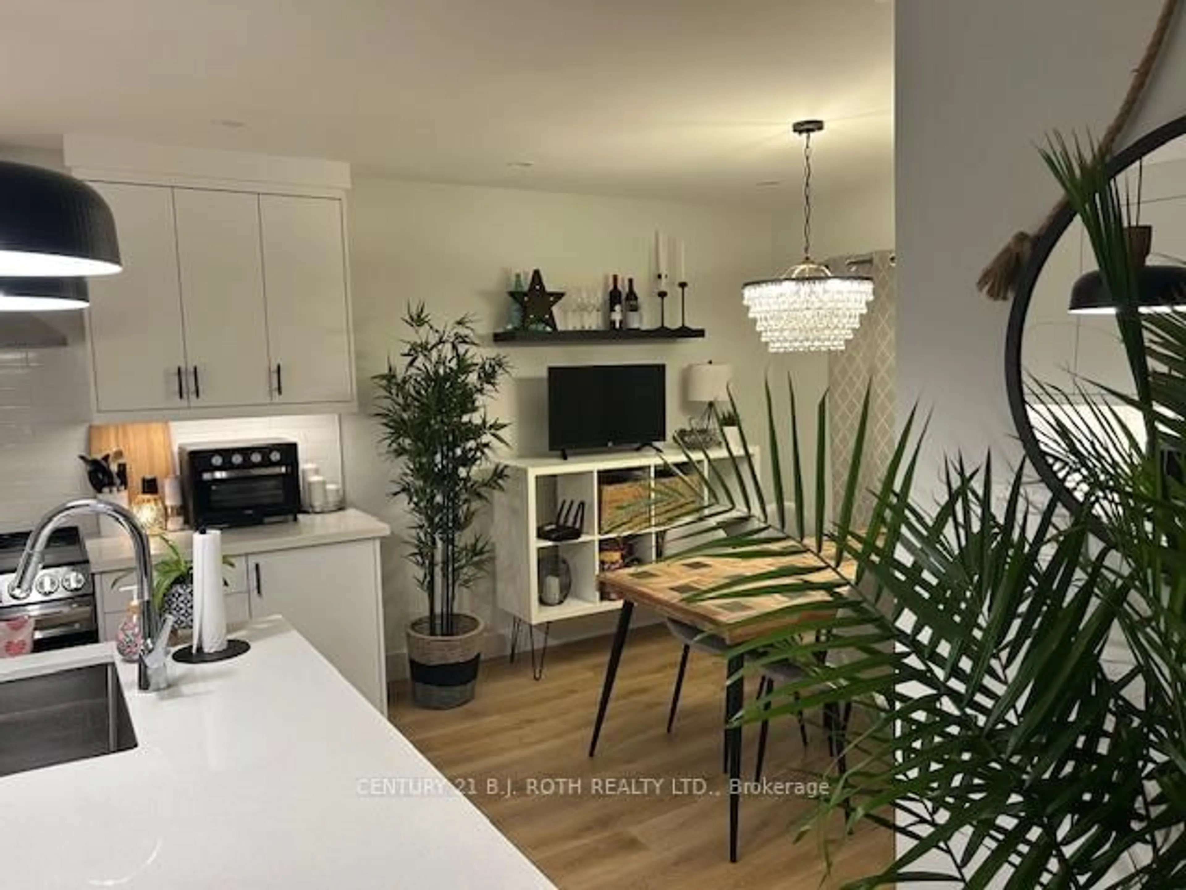 Open concept kitchen, wood/laminate floor for 86 Doran Rd, Springwater Ontario L0L 1X0