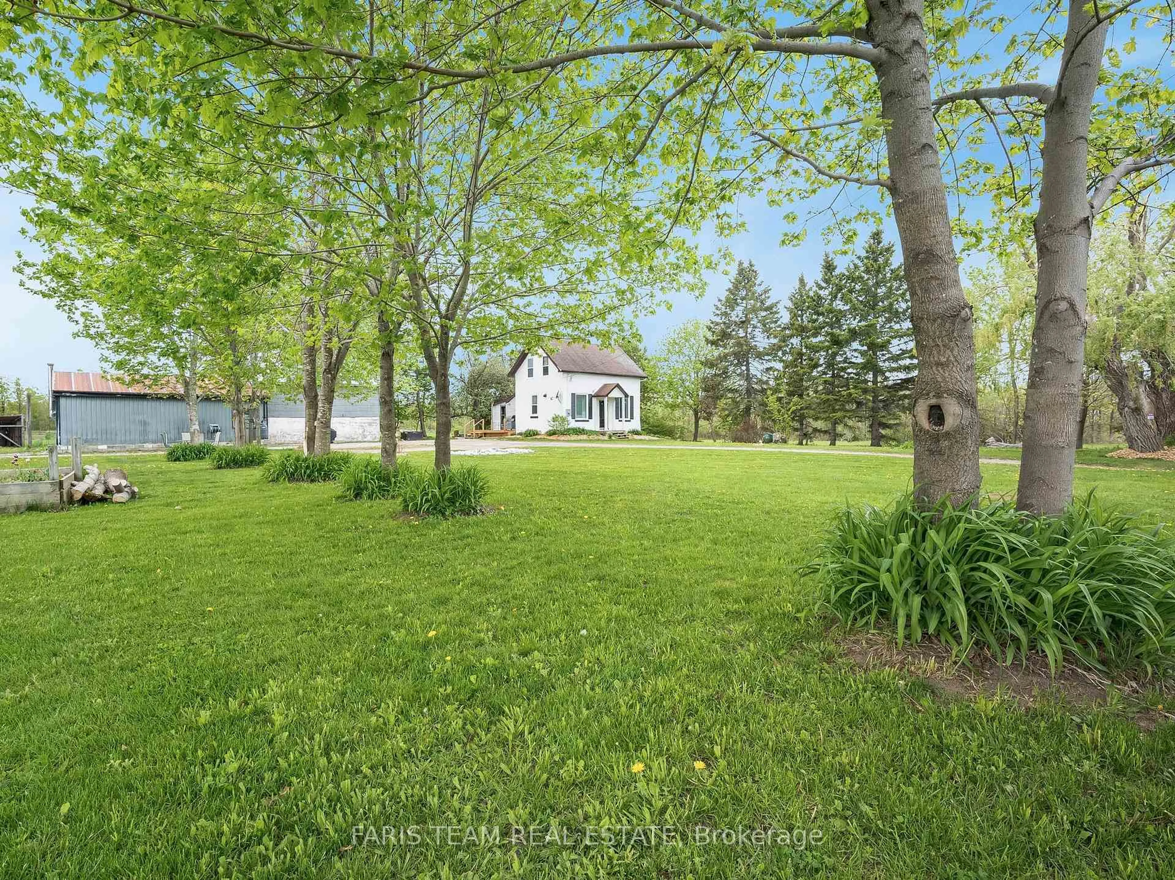 A pic from outside/outdoor area/front of a property/back of a property/a pic from drone, forest/trees view for 9564 Highway 12, Oro-Medonte Ontario L3V 6H2