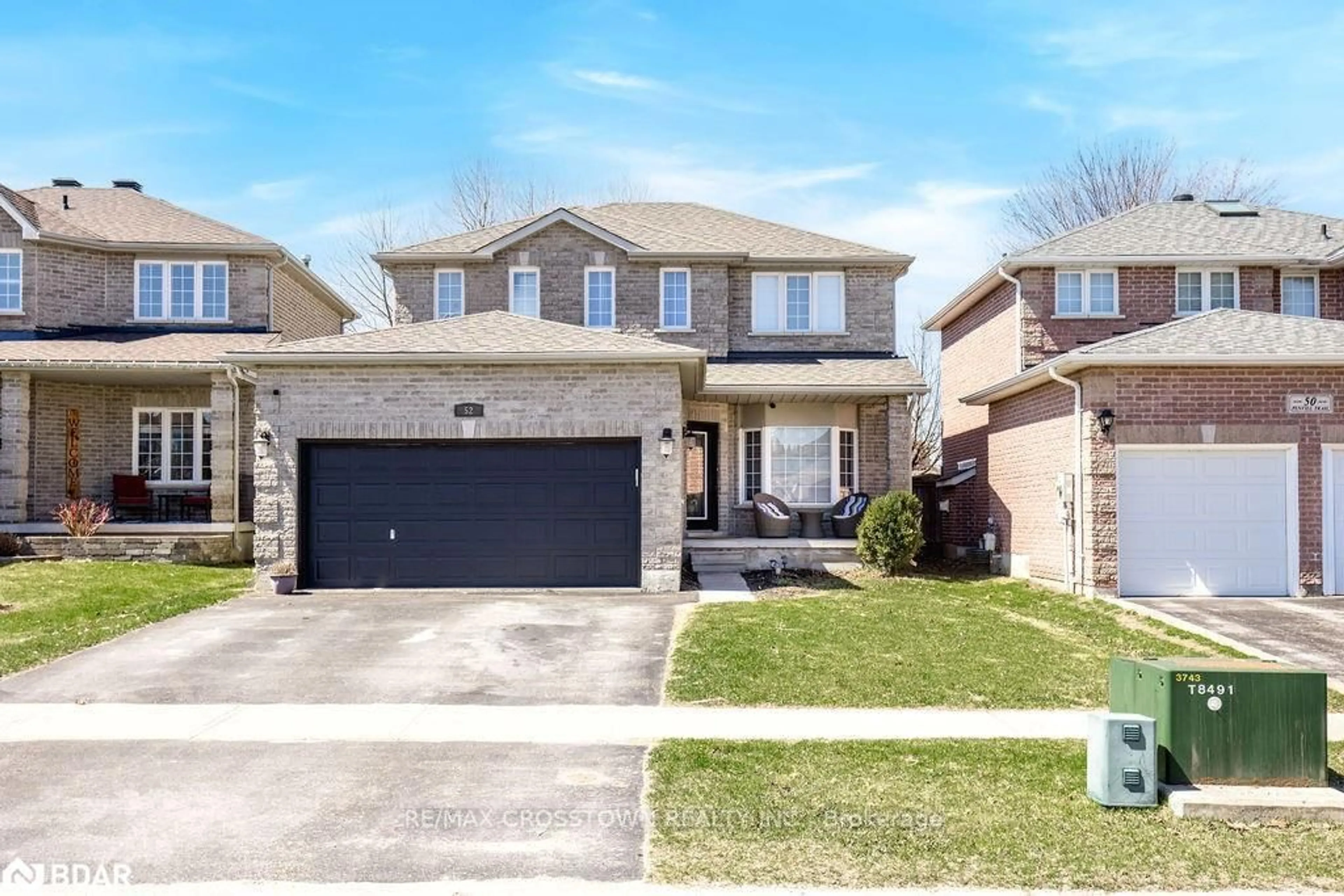 Home with brick exterior material, street for 52 Penvill Tr, Barrie Ontario L4N 5M8