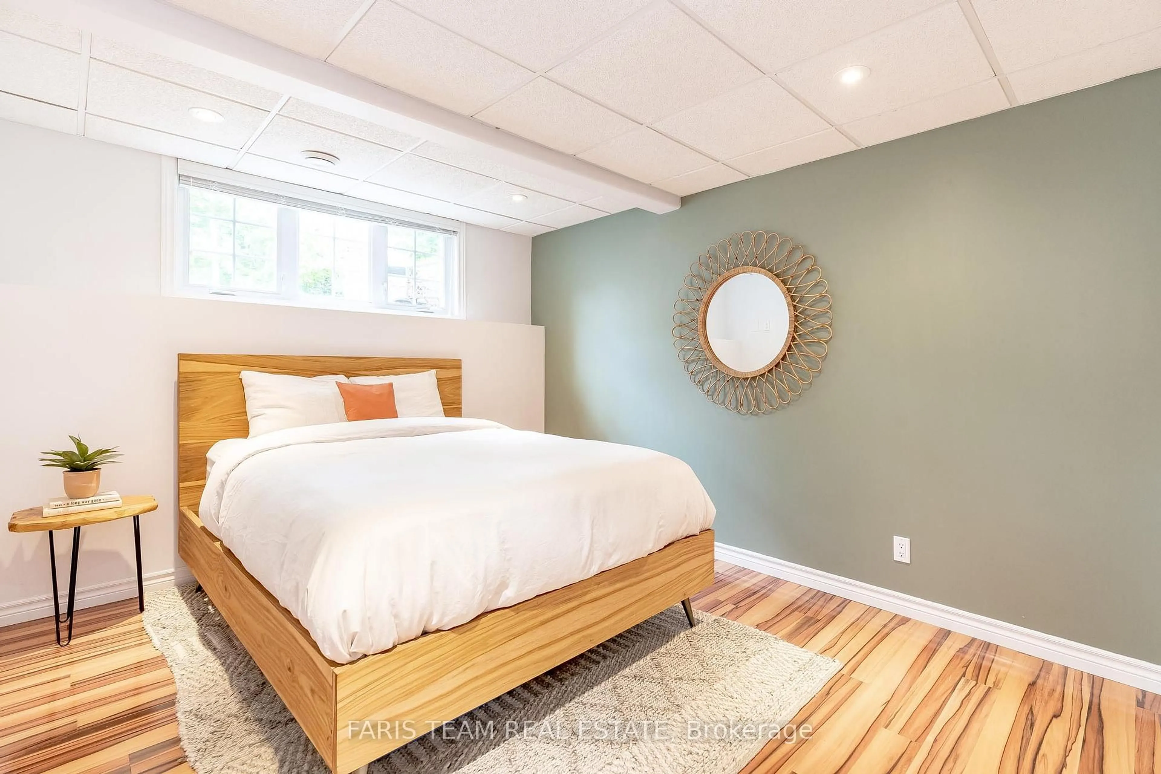 Bedroom with bed, wood/laminate floor for 39 Saint Laurent Blvd, Tiny Ontario L9M 1R3