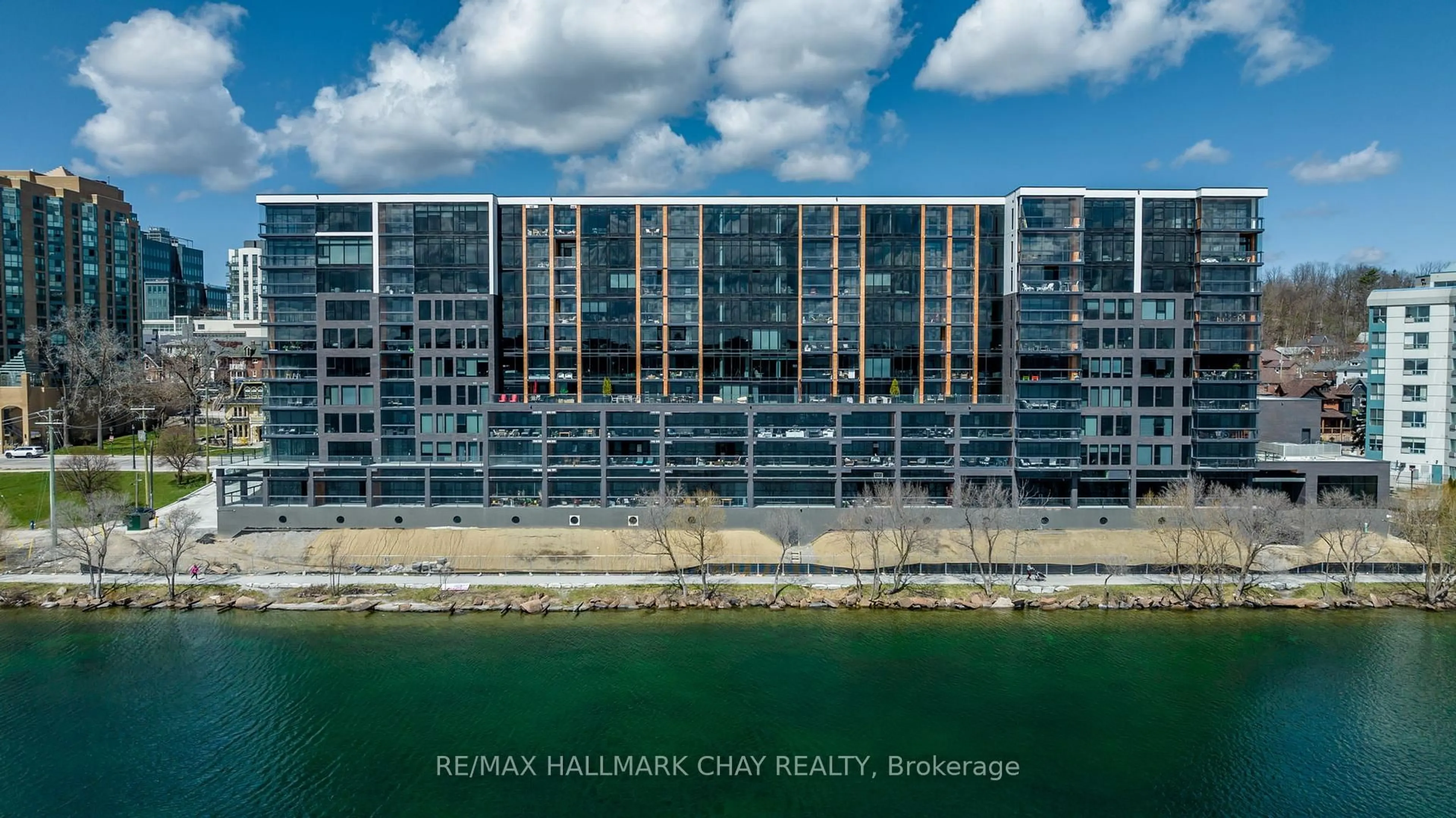 A pic from outside/outdoor area/front of a property/back of a property/a pic from drone, water/lake/river/ocean view for 185 Dunlop St #PH07, Barrie Ontario L4M 1B2