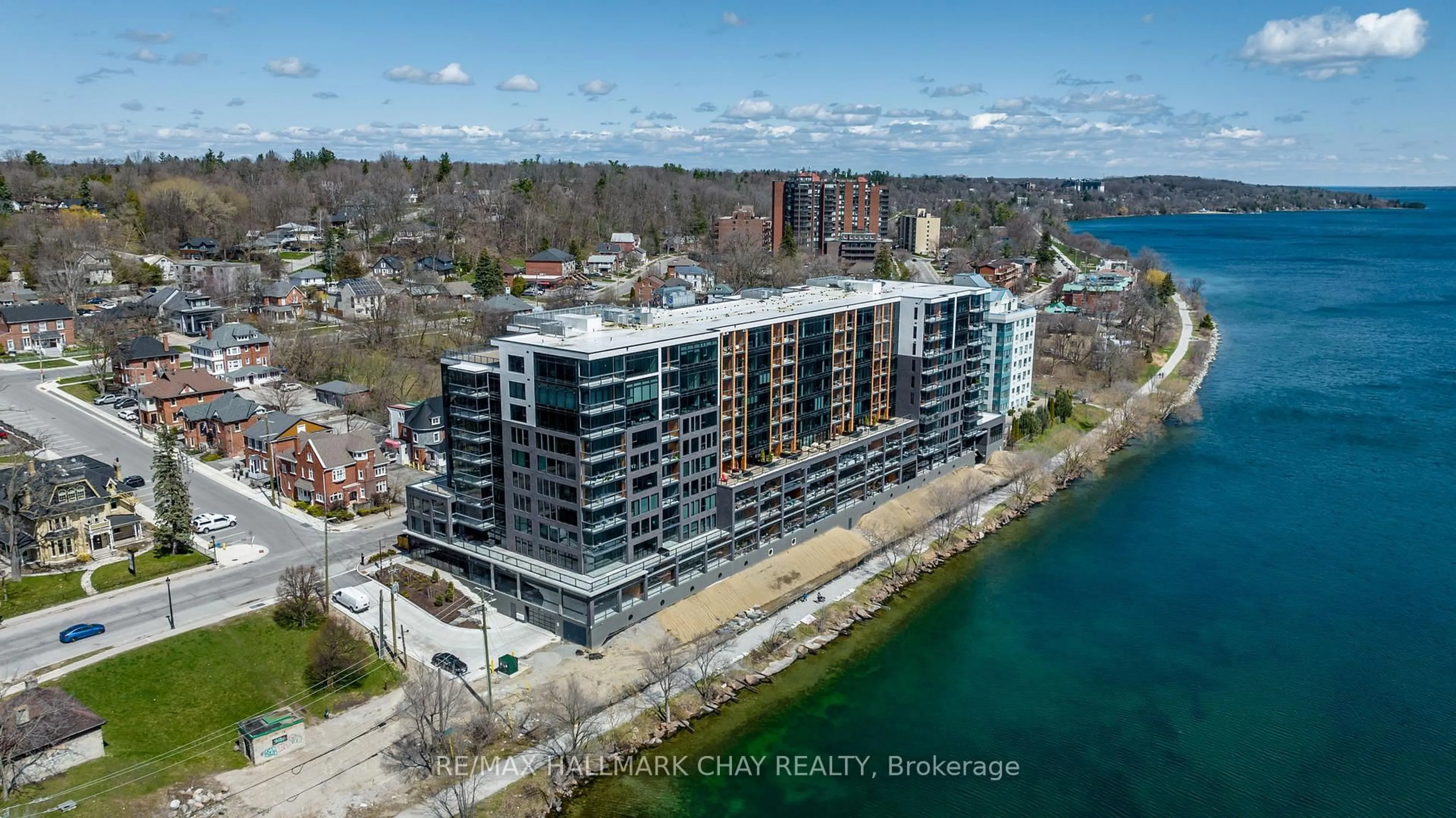 A pic from outside/outdoor area/front of a property/back of a property/a pic from drone, water/lake/river/ocean view for 185 Dunlop St #PH07, Barrie Ontario L4M 1B2