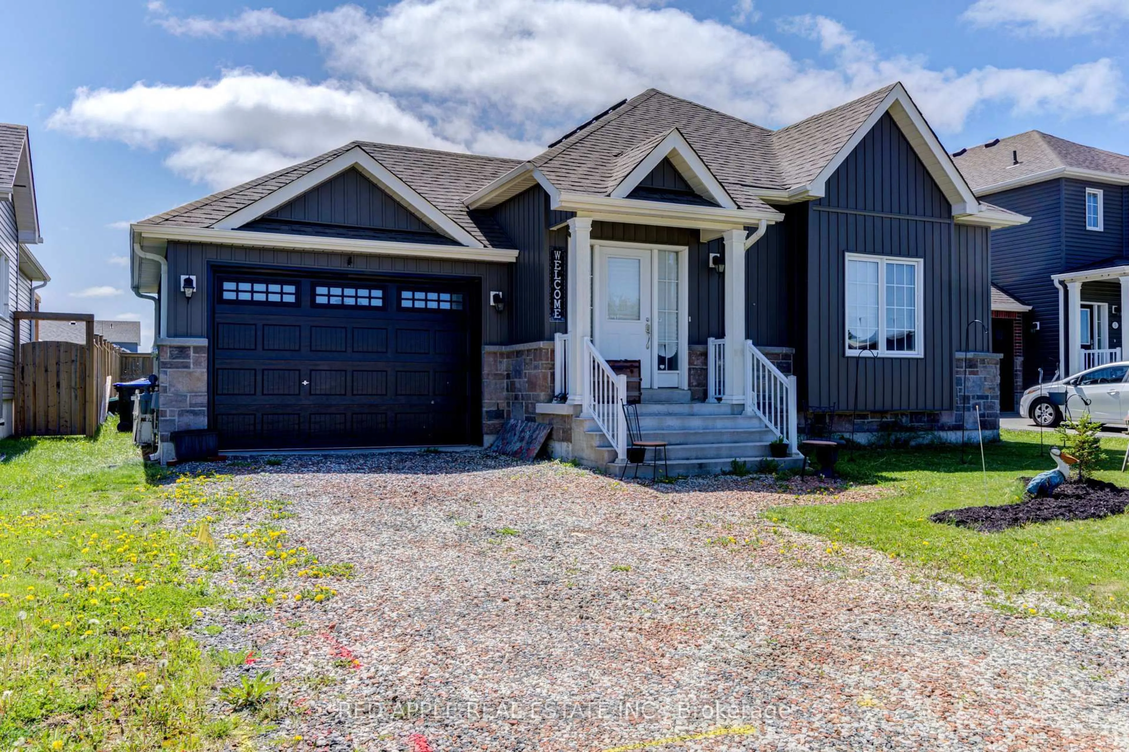 Home with vinyl exterior material, street for 5 Beverly St, Springwater Ontario L0L 1P0