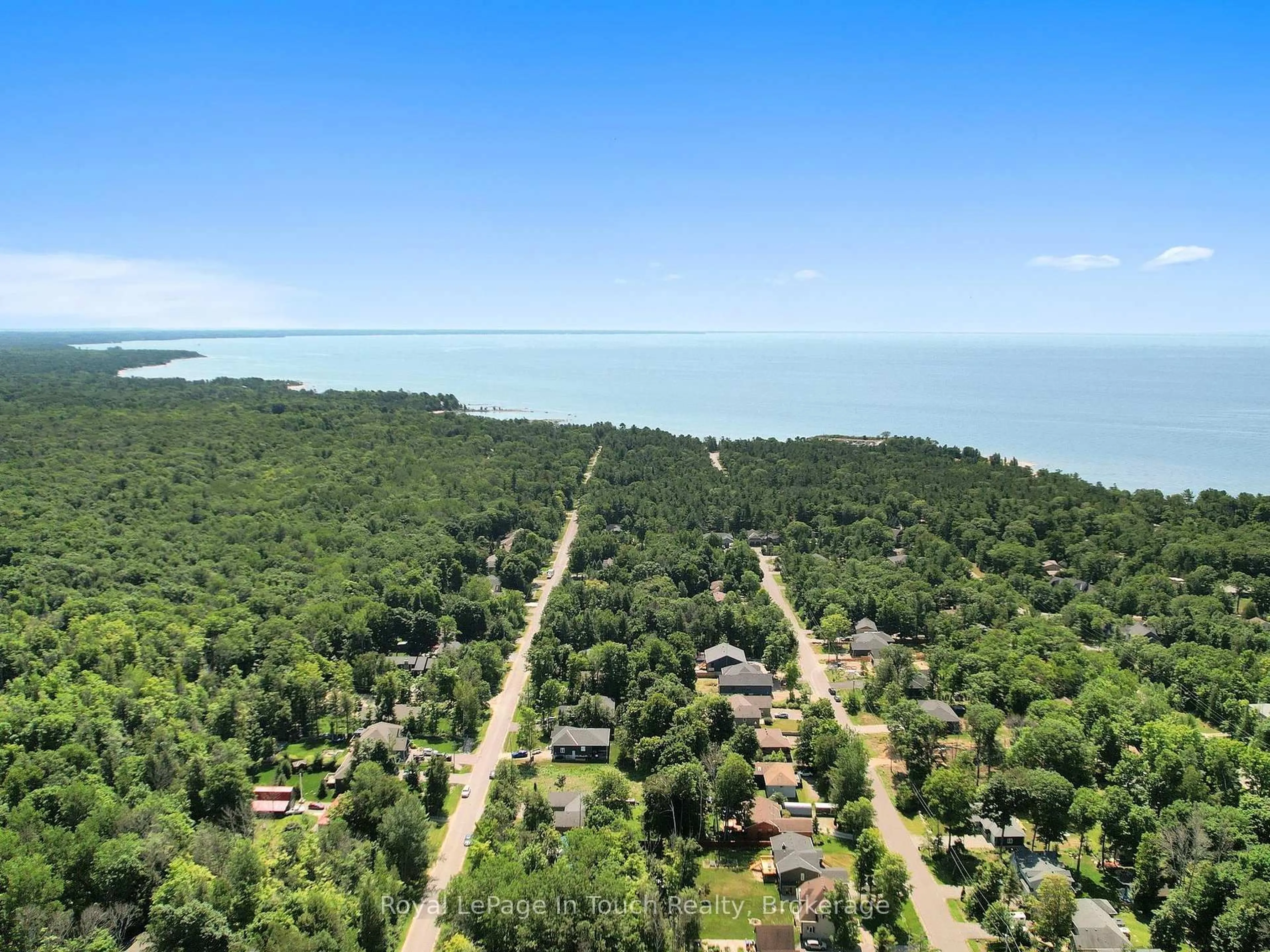 A pic from outside/outdoor area/front of a property/back of a property/a pic from drone, water/lake/river/ocean view for 122 Trout Lane, Tiny Ontario L9M 0J1