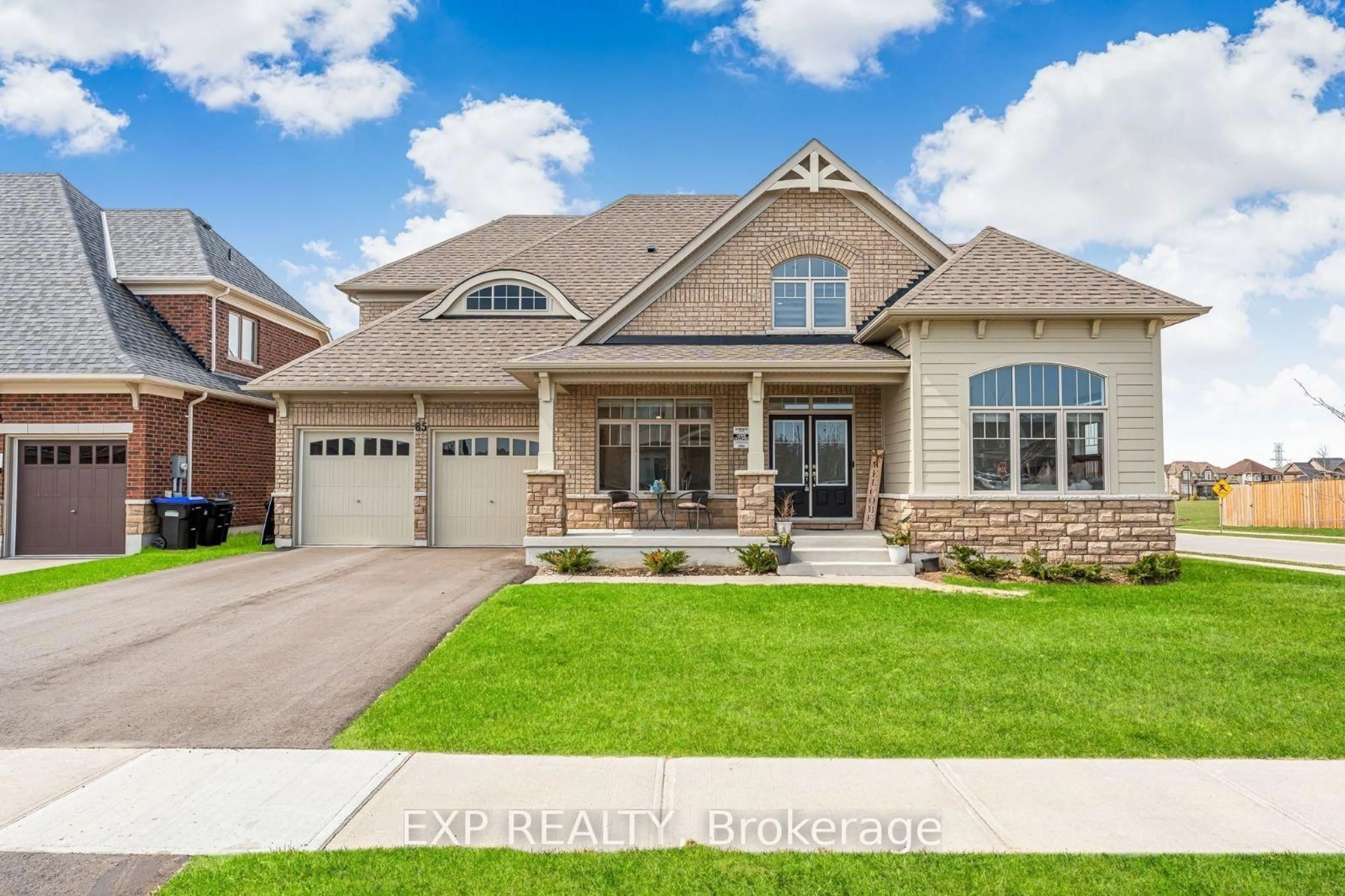 Home with brick exterior material, street for 85 Redmond Cres, Springwater Ontario L9X 1Z8