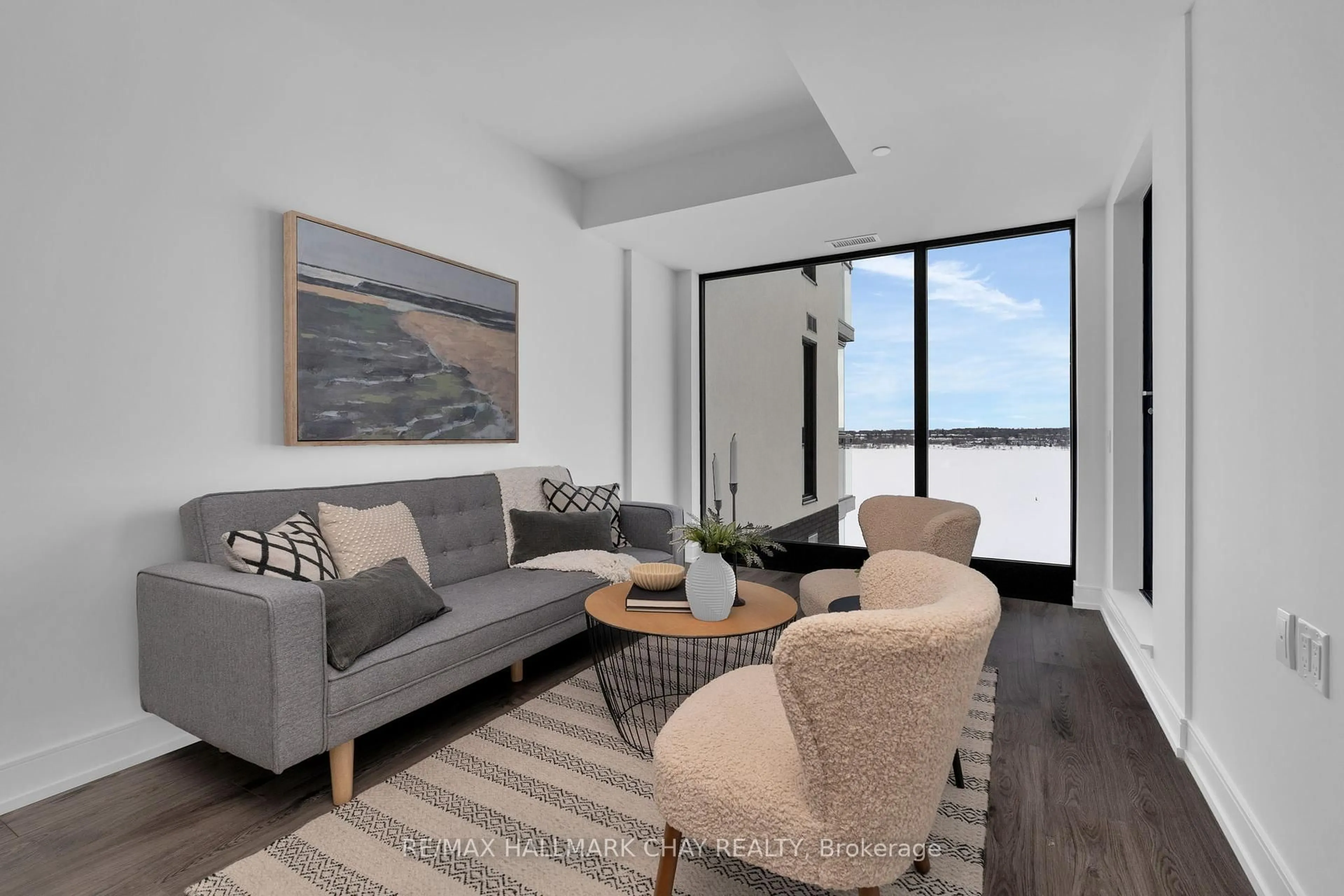 Living room with furniture, unknown for 185 Dunlop St #810, Barrie Ontario L4M 1B2