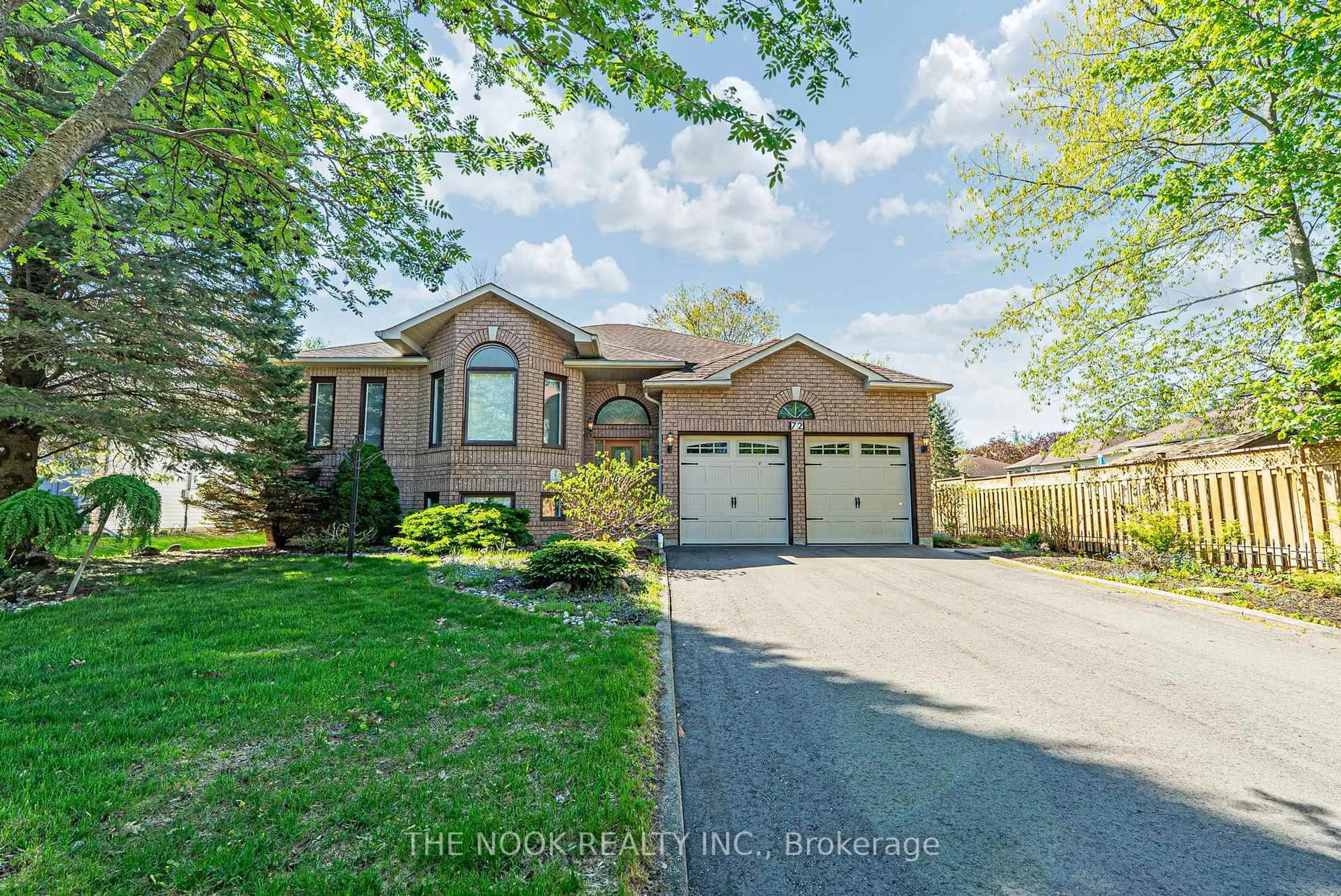 Home with brick exterior material, street for 72 Silver Birch Ave, Wasaga Beach Ontario L9Z 1M2