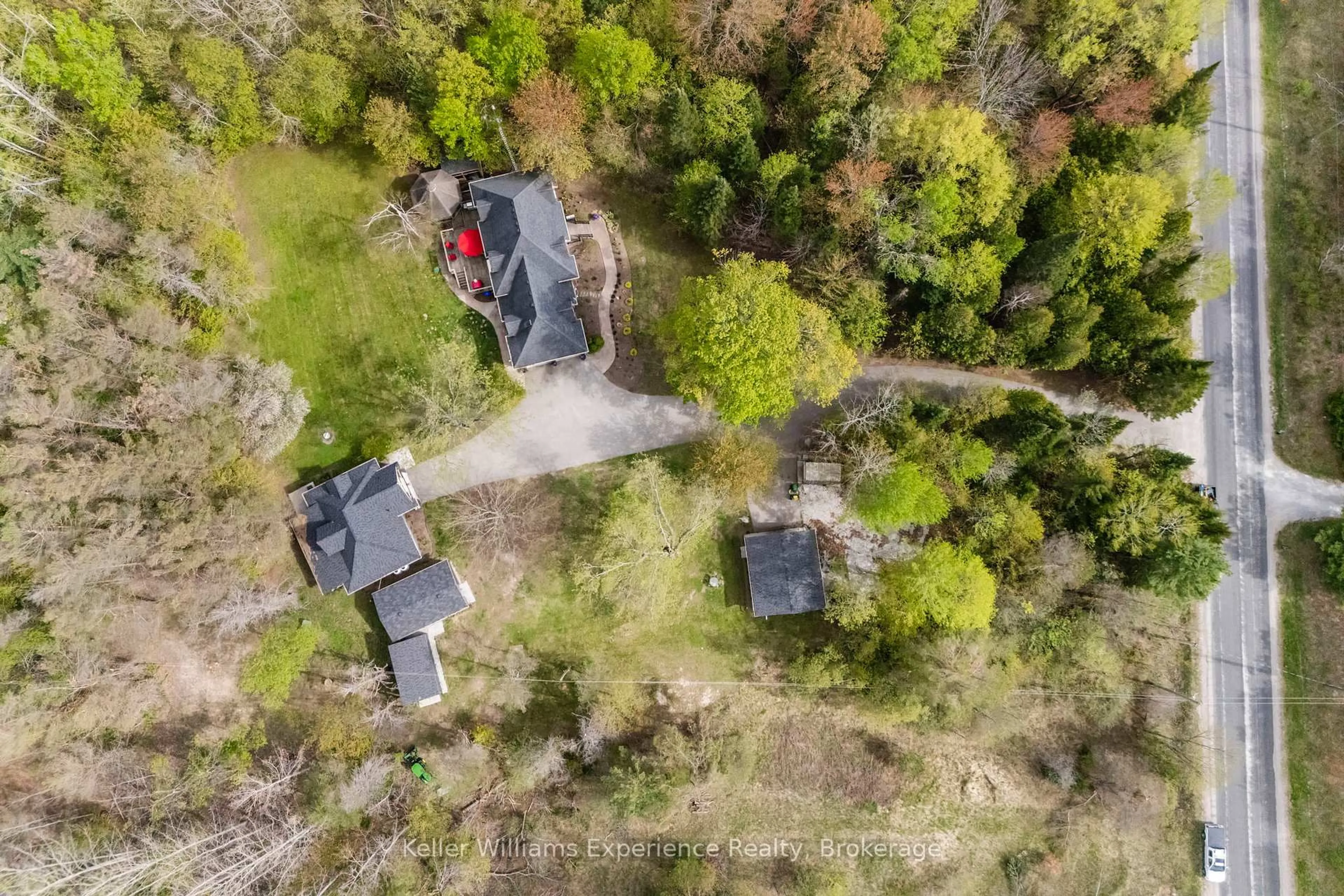 A pic from outside/outdoor area/front of a property/back of a property/a pic from drone, unknown for 1051 Old Second Rd, Springwater Ontario L0L 2K0
