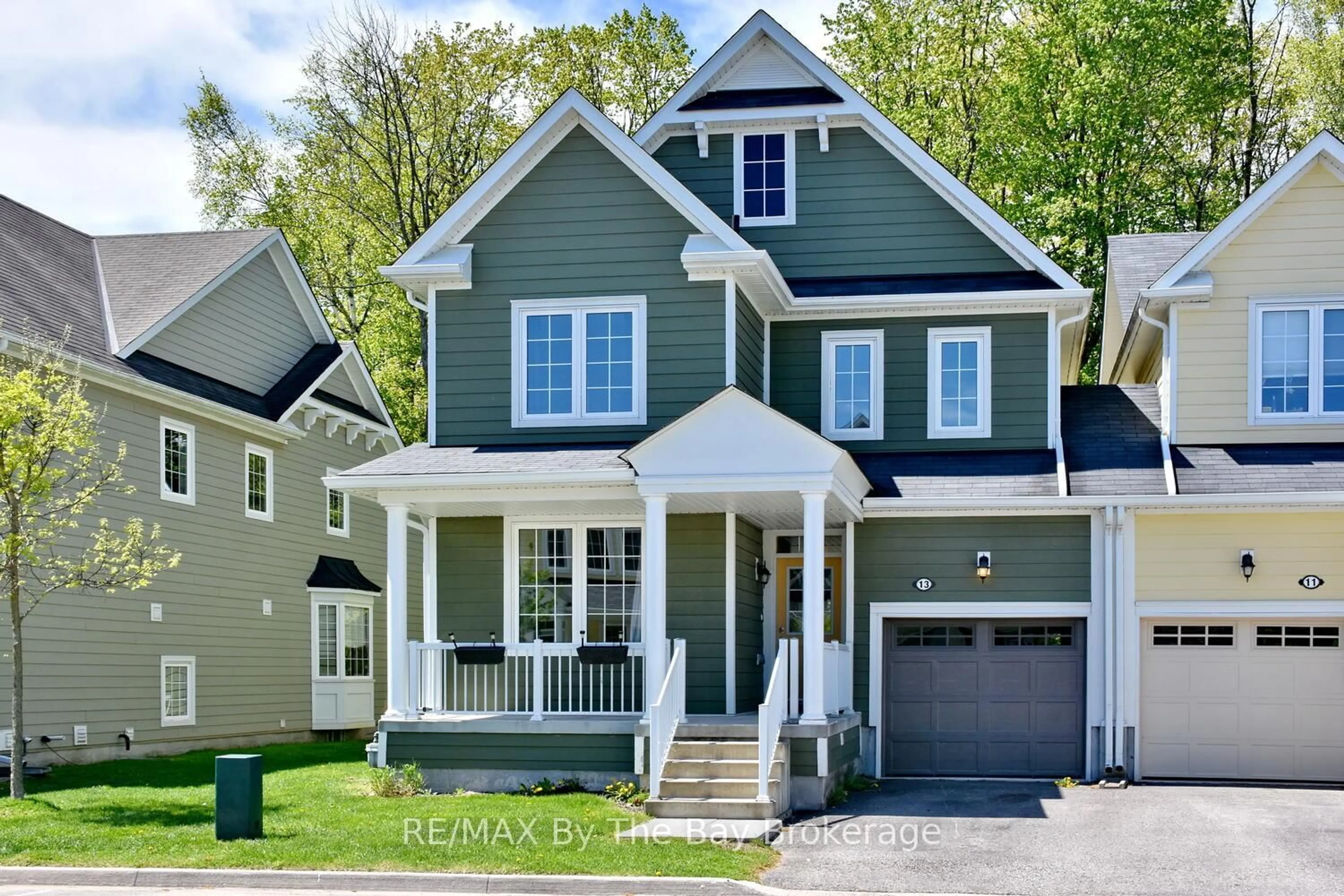 Home with vinyl exterior material, street for 13 Berkshire Ave, Wasaga Beach Ontario L9Z 0G3