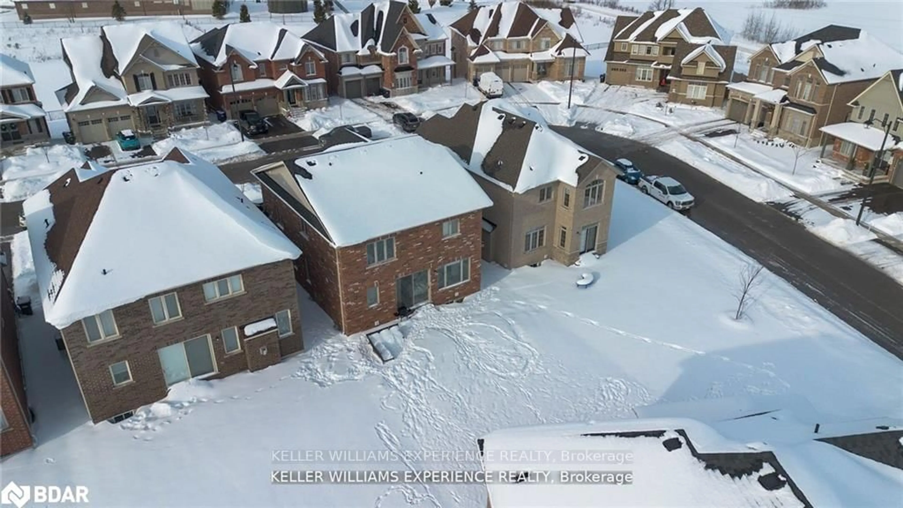 A pic from outside/outdoor area/front of a property/back of a property/a pic from drone, street for 26 Sanford Circ, Springwater Ontario L9X 2A8