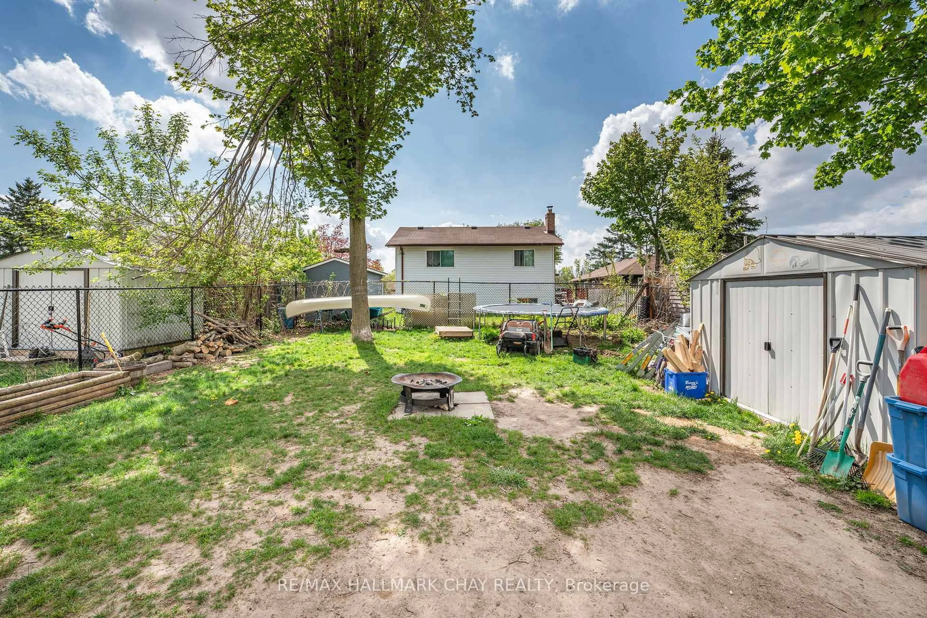 A pic from outside/outdoor area/front of a property/back of a property/a pic from drone, unknown for 12 Bronte Cres, Barrie Ontario L4N 5B7
