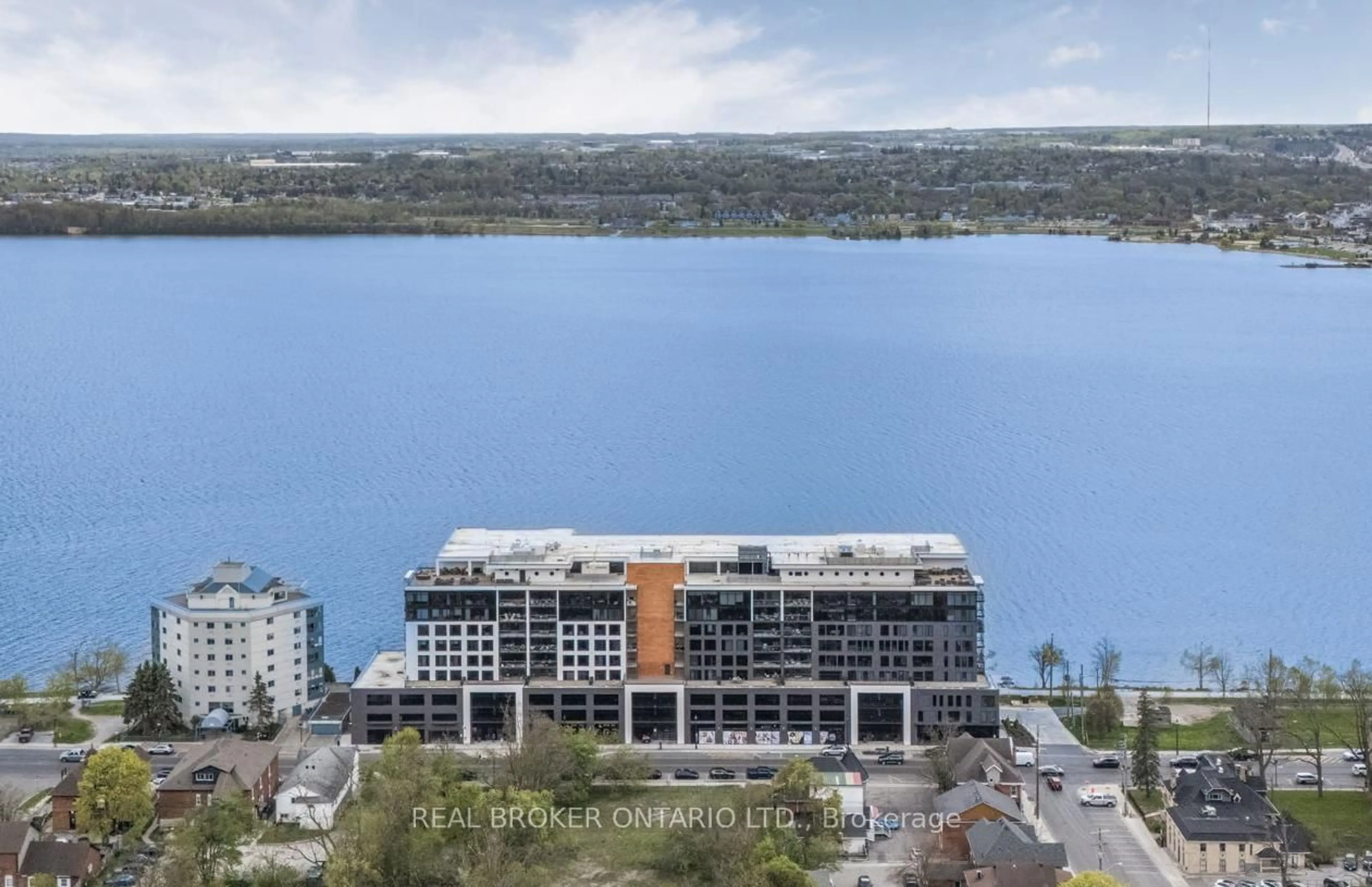 A pic from outside/outdoor area/front of a property/back of a property/a pic from drone, water/lake/river/ocean view for 185 Dunlop St #PH 3, Barrie Ontario L4M 0L7