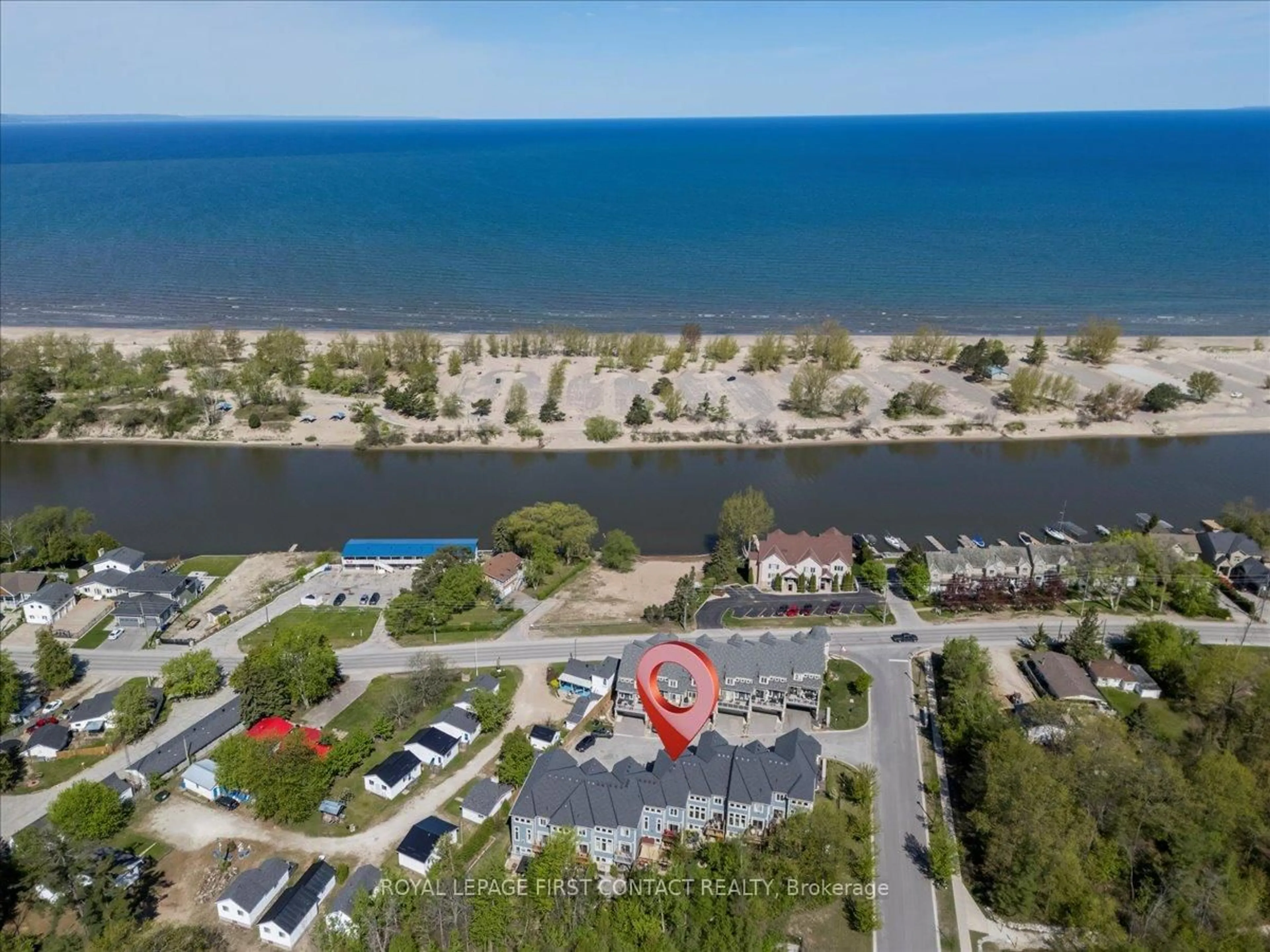 A pic from outside/outdoor area/front of a property/back of a property/a pic from drone, water/lake/river/ocean view for 8 Nautical Lane, Wasaga Beach Ontario L9Z 0G1