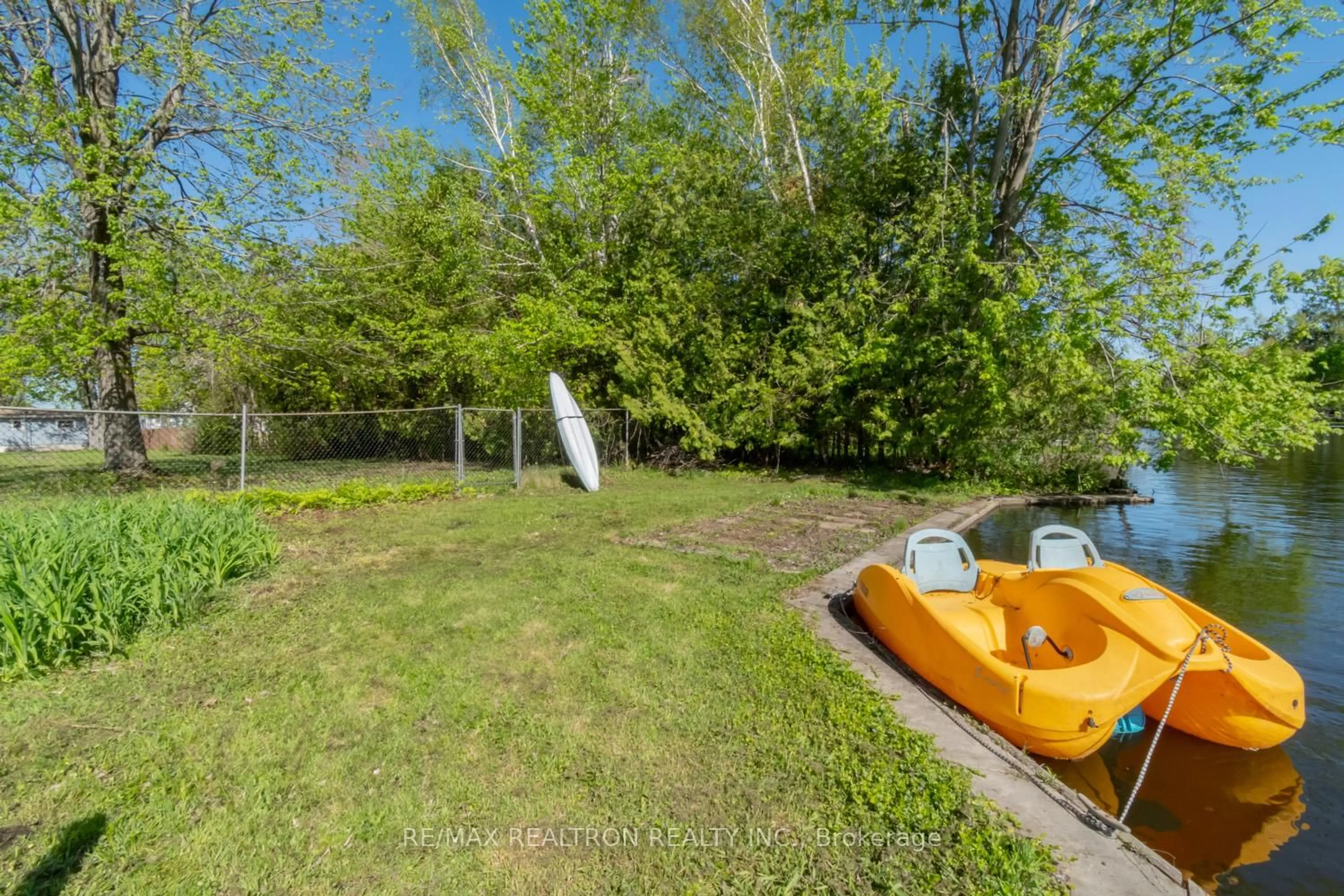 A pic from outside/outdoor area/front of a property/back of a property/a pic from drone, water/lake/river/ocean view for 31 Lake Ave, Ramara Ontario L0K 1B0