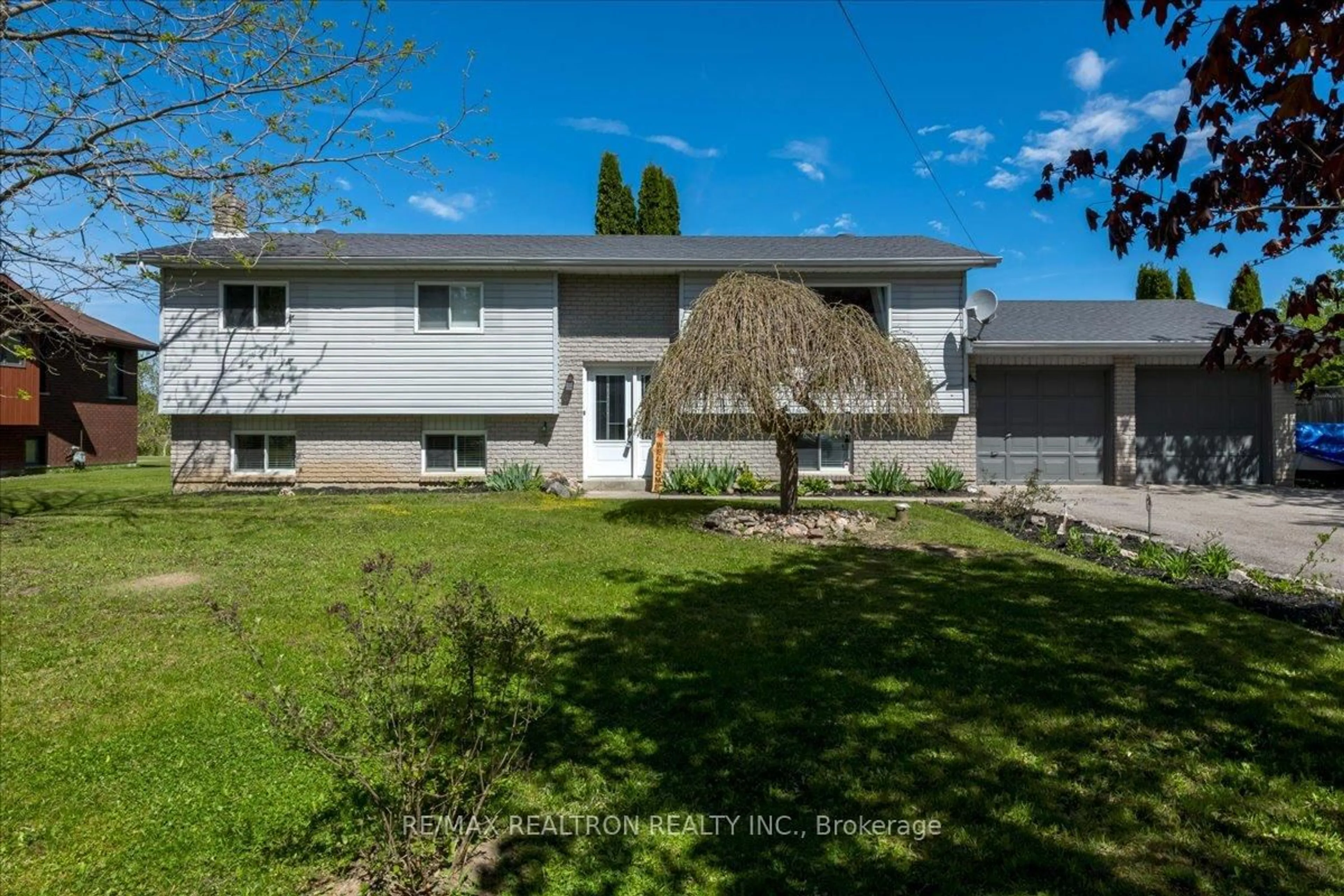 A pic from outside/outdoor area/front of a property/back of a property/a pic from drone, street for 3974 Horseshoe Valley Rd, Springwater Ontario L0L 1Y0