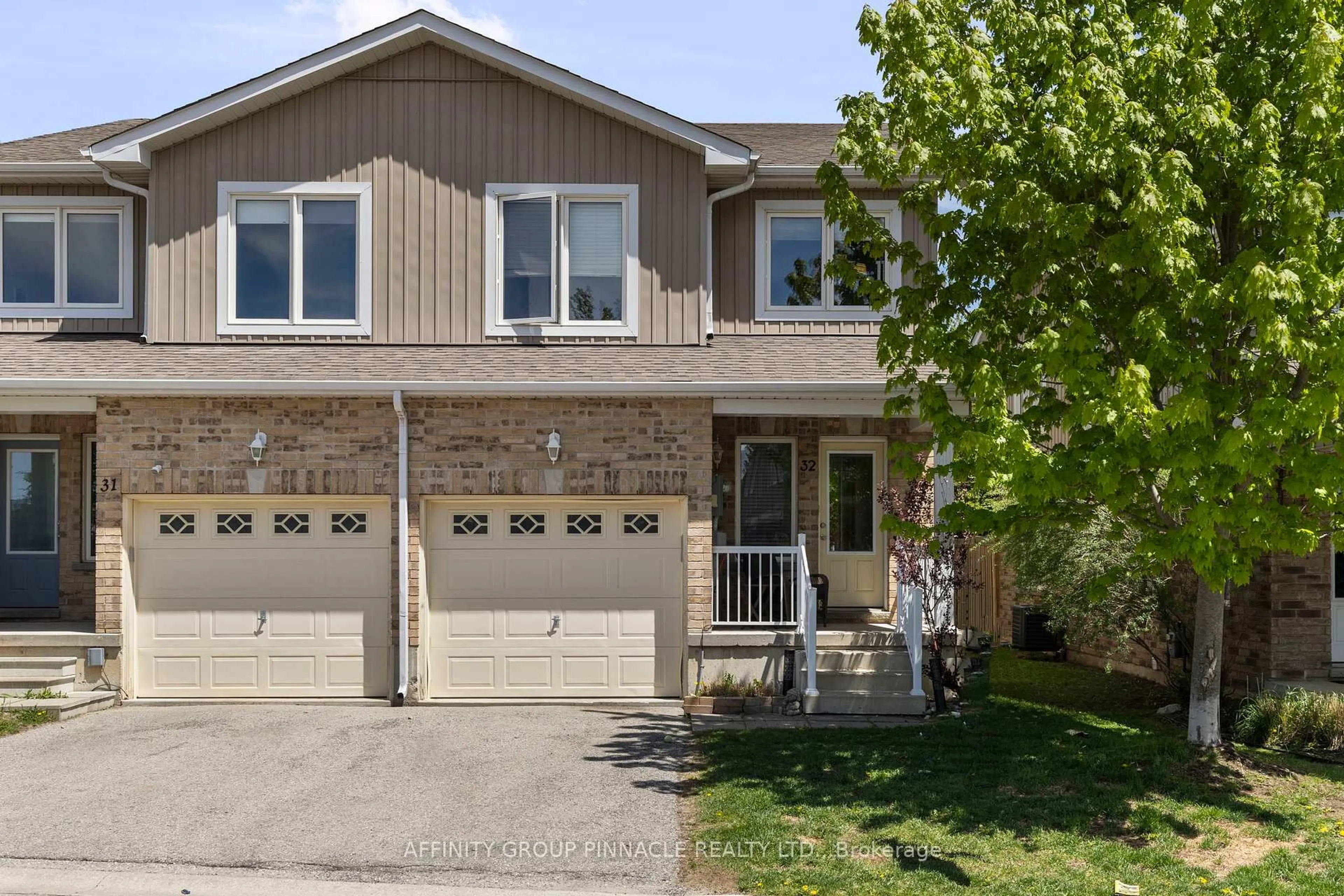 Home with brick exterior material, street for 75 Prince William Way #32, Barrie Ontario L4M 7P5