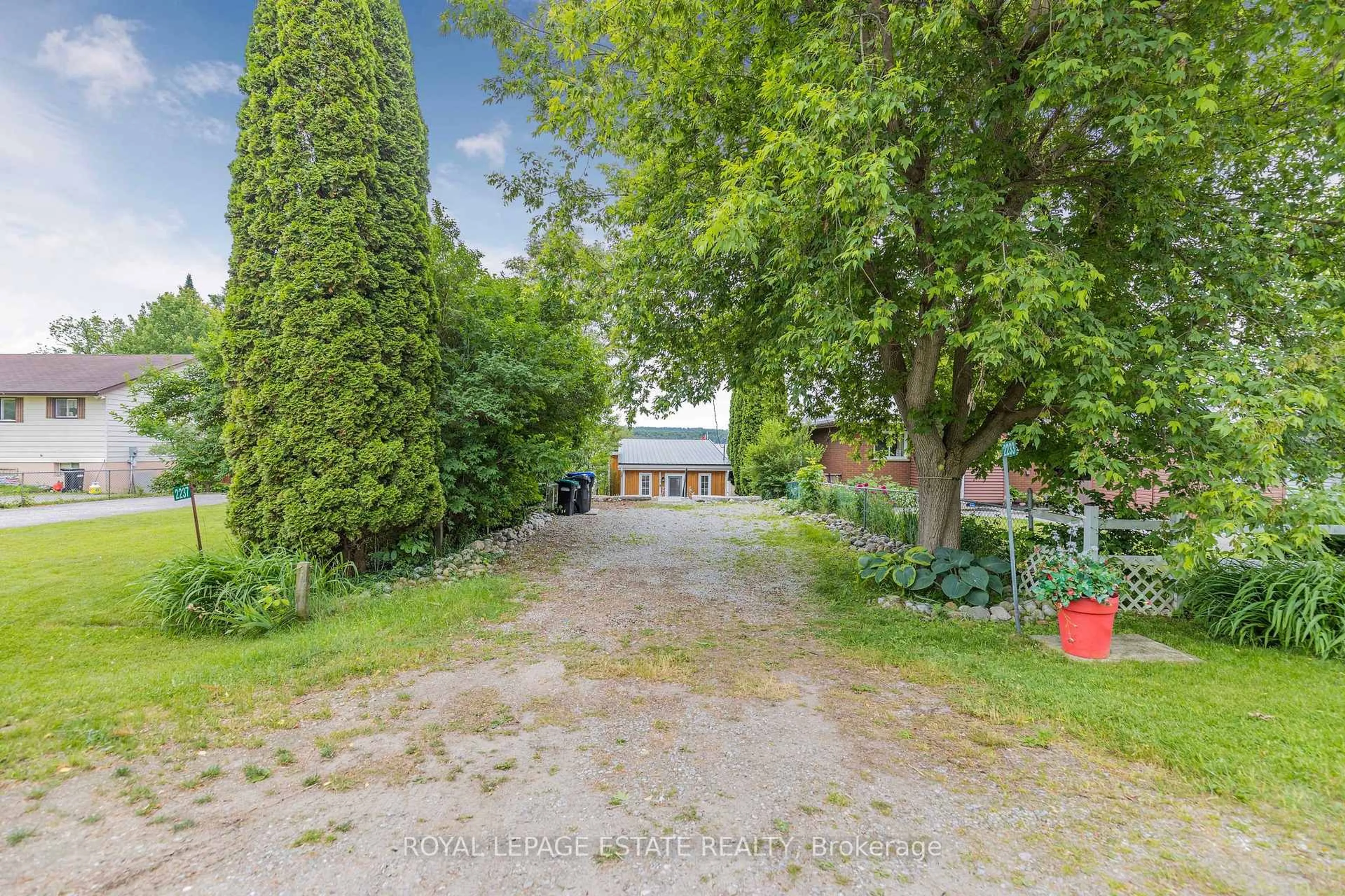 A pic from outside/outdoor area/front of a property/back of a property/a pic from drone, street for 2233 North Orr Lake Rd, Springwater Ontario L0L 1P0