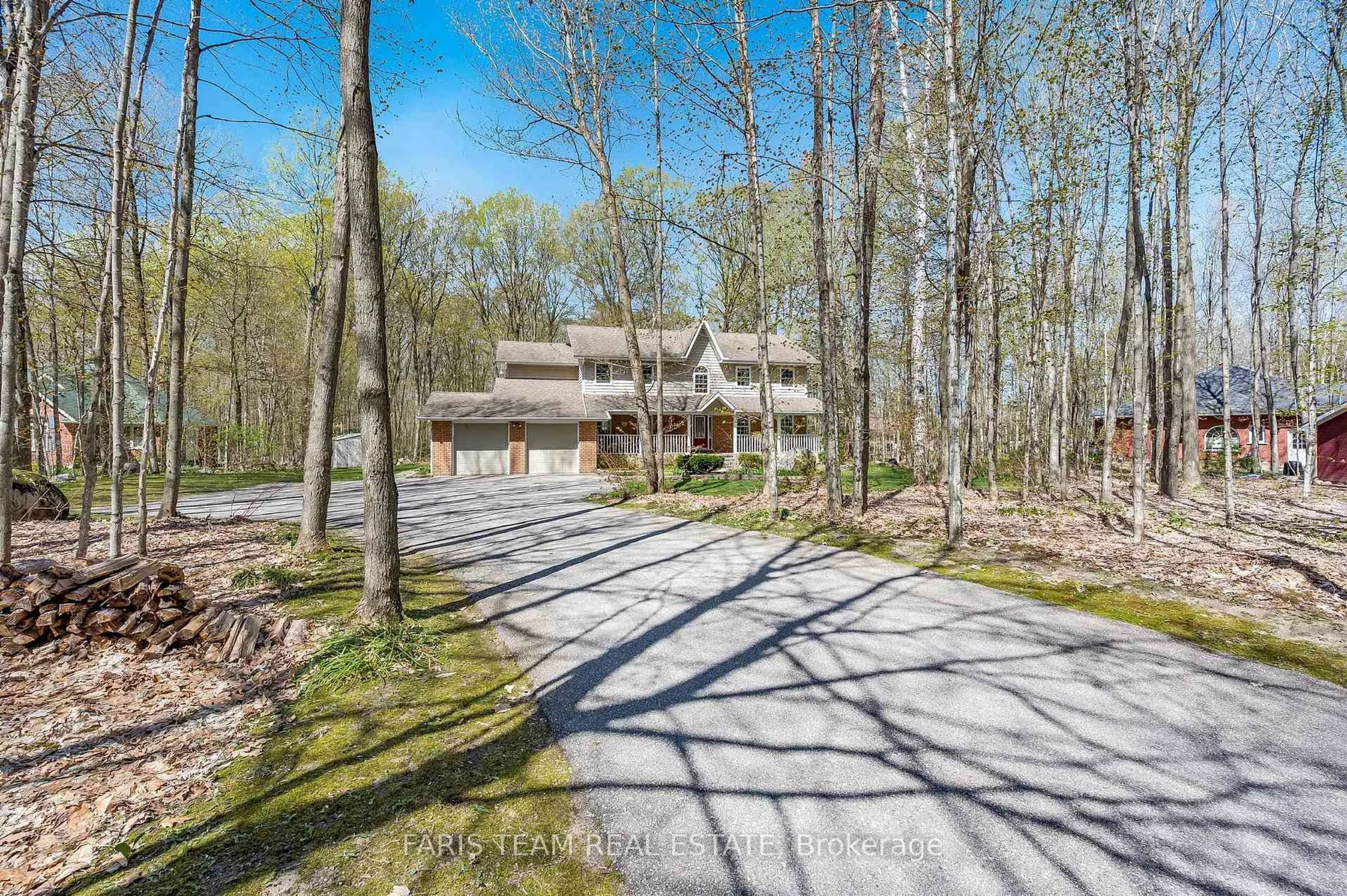 A pic from outside/outdoor area/front of a property/back of a property/a pic from drone, forest/trees view for 64 Goldfinch Cres, Tiny Ontario L0L 2J0