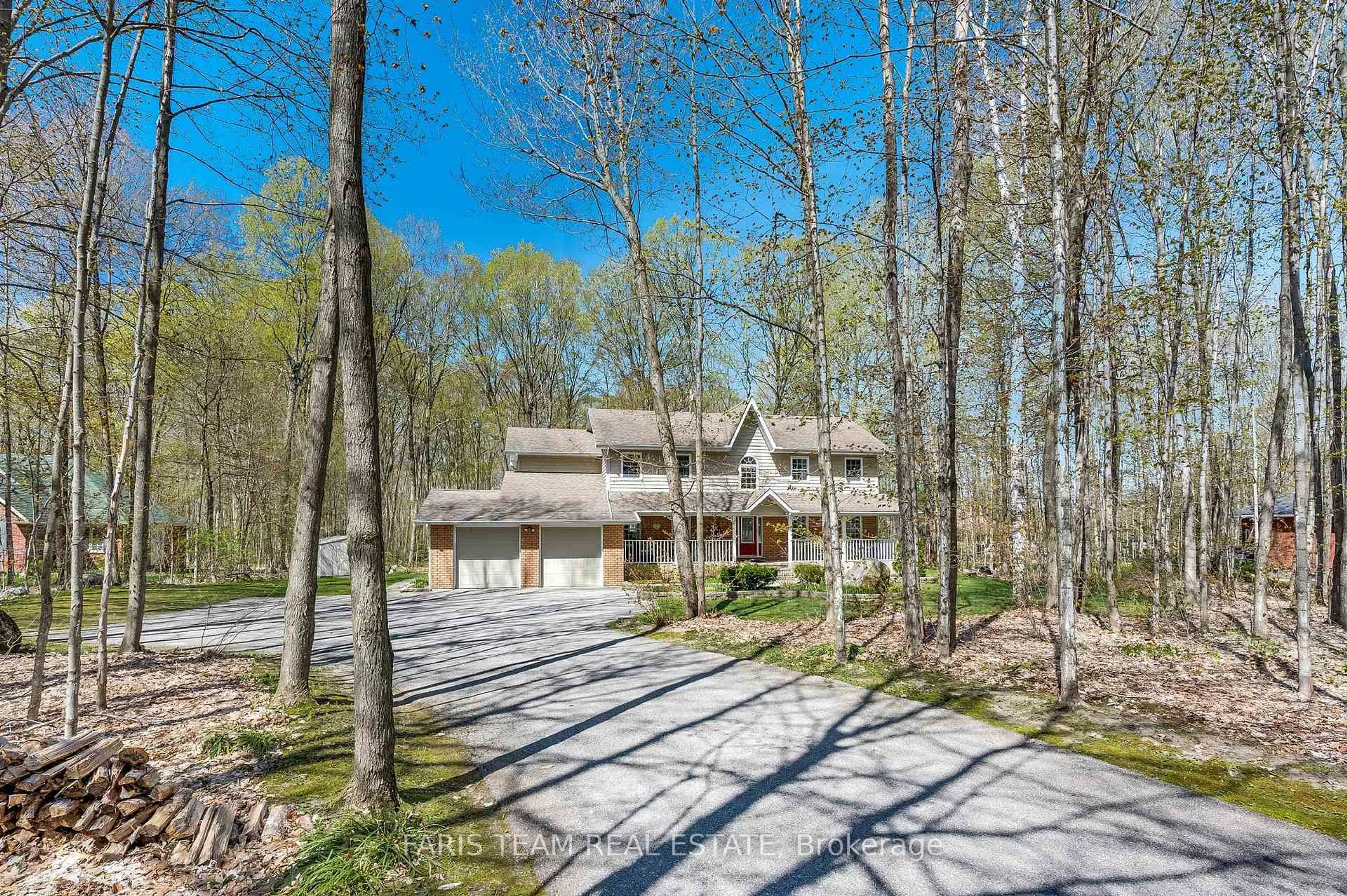 A pic from outside/outdoor area/front of a property/back of a property/a pic from drone, forest/trees view for 64 Goldfinch Cres, Tiny Ontario L0L 2J0