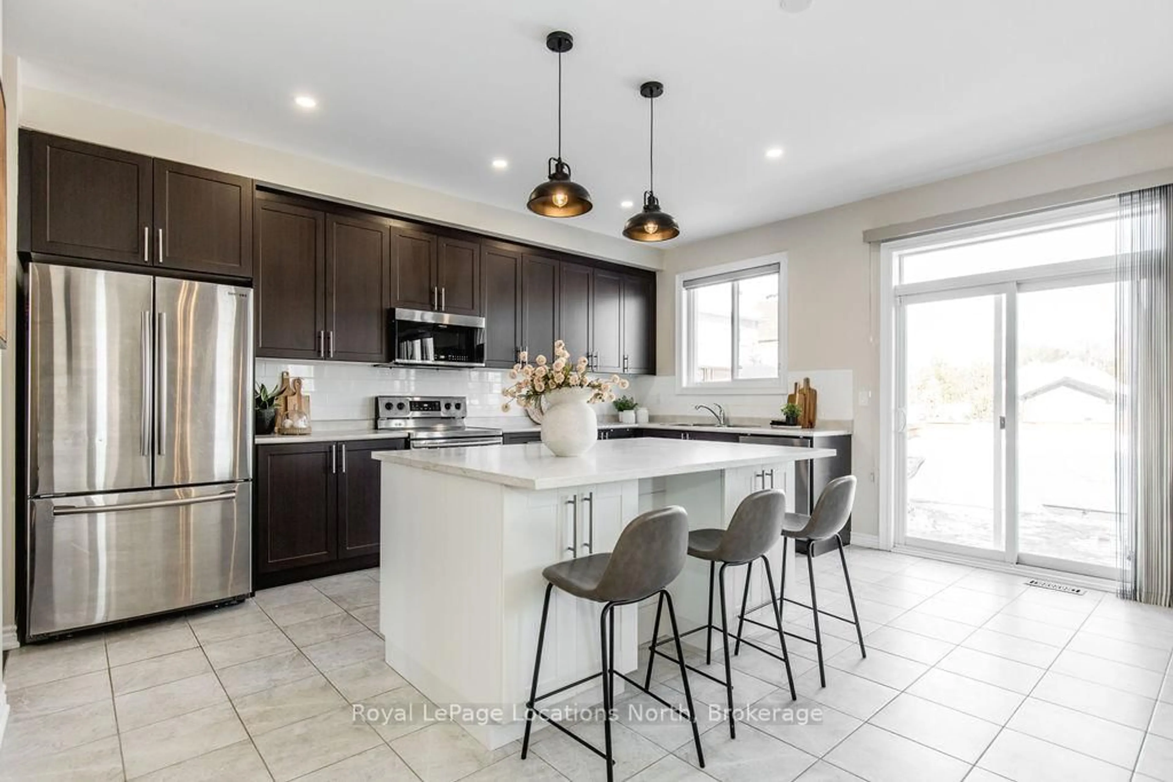 Open concept kitchen, ceramic/tile floor for 13 Academy Ave, Wasaga Beach Ontario L9Z 0G9