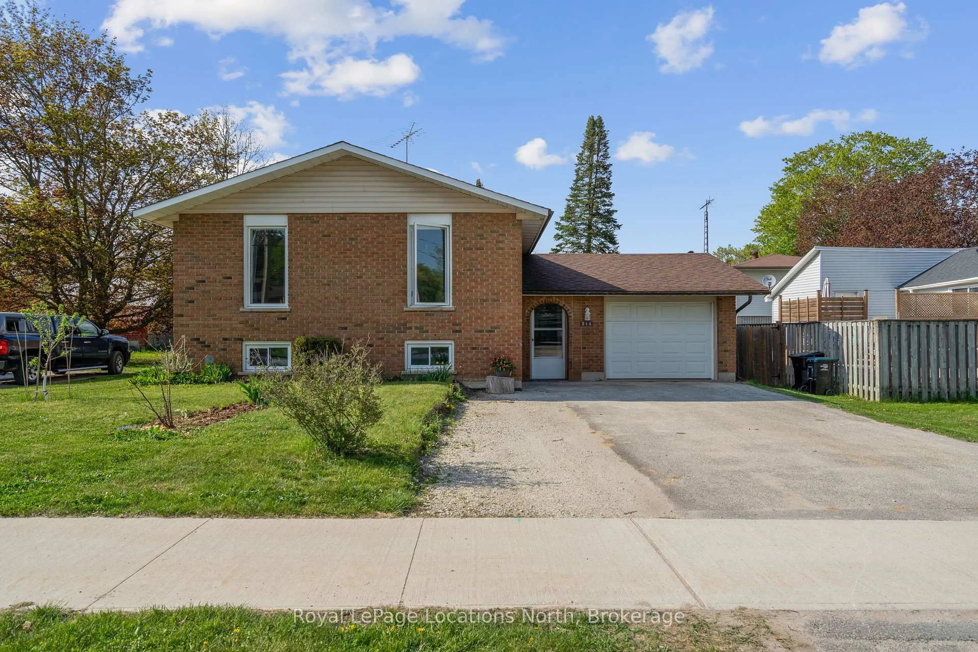 Home with brick exterior material, street for 214 Sunnidale St, Clearview Ontario L0M 1S0