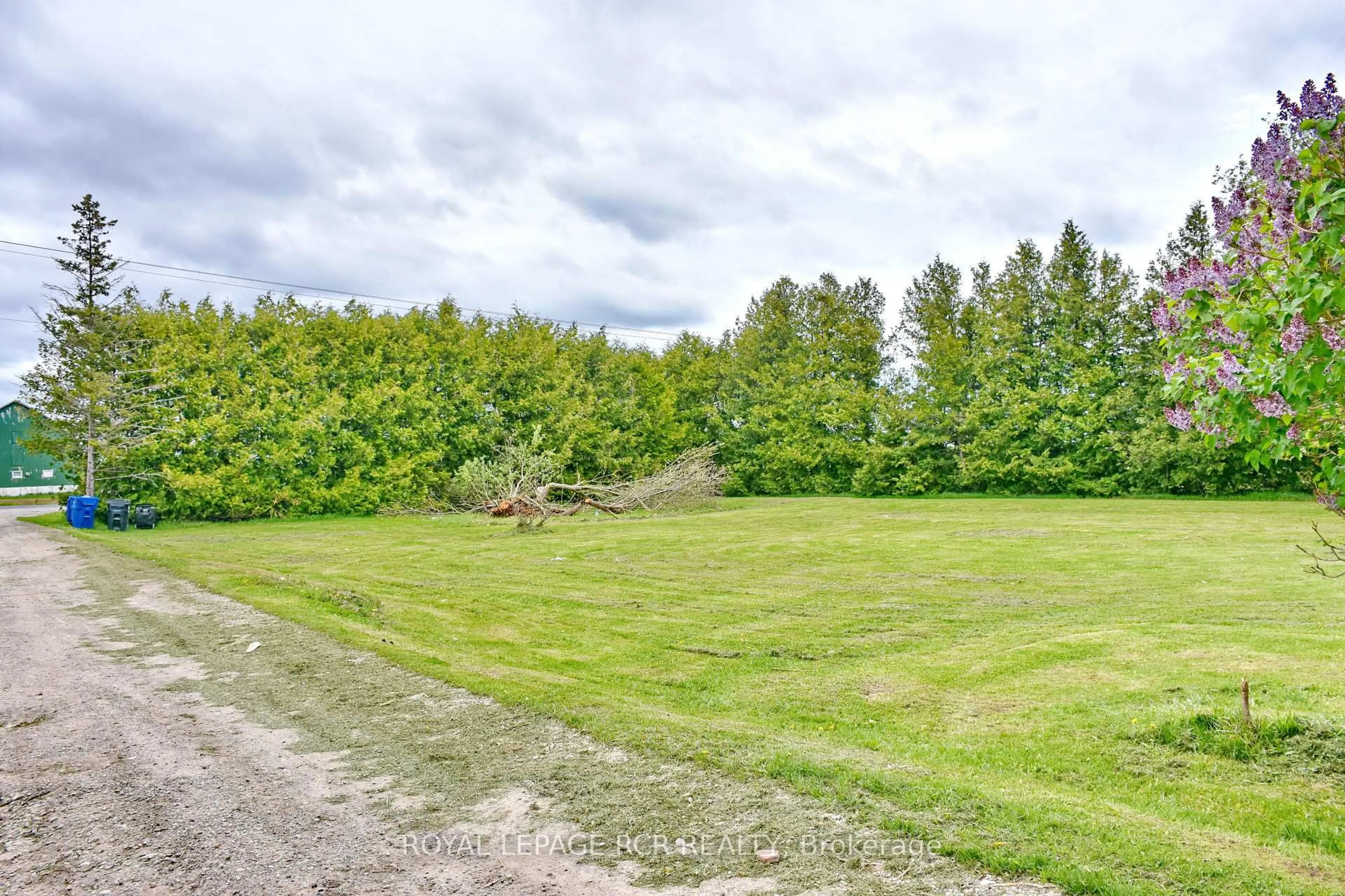 A pic from outside/outdoor area/front of a property/back of a property/a pic from drone, forest/trees view for 2606 Crossland Rd, Springwater Ontario L0L 1P0