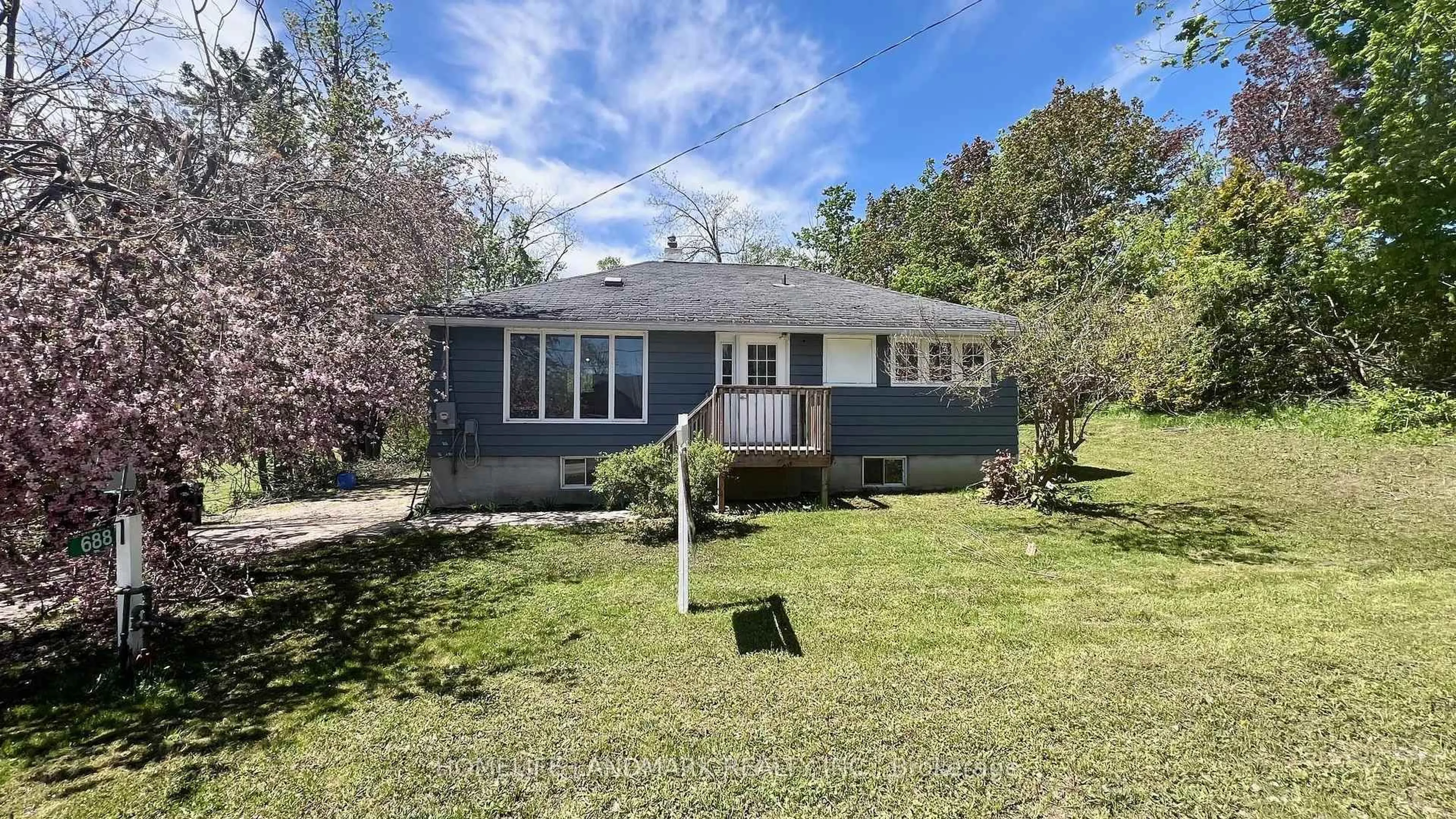 A pic from outside/outdoor area/front of a property/back of a property/a pic from drone, street for 688 7th Line, Oro-Medonte Ontario L0L 2E0