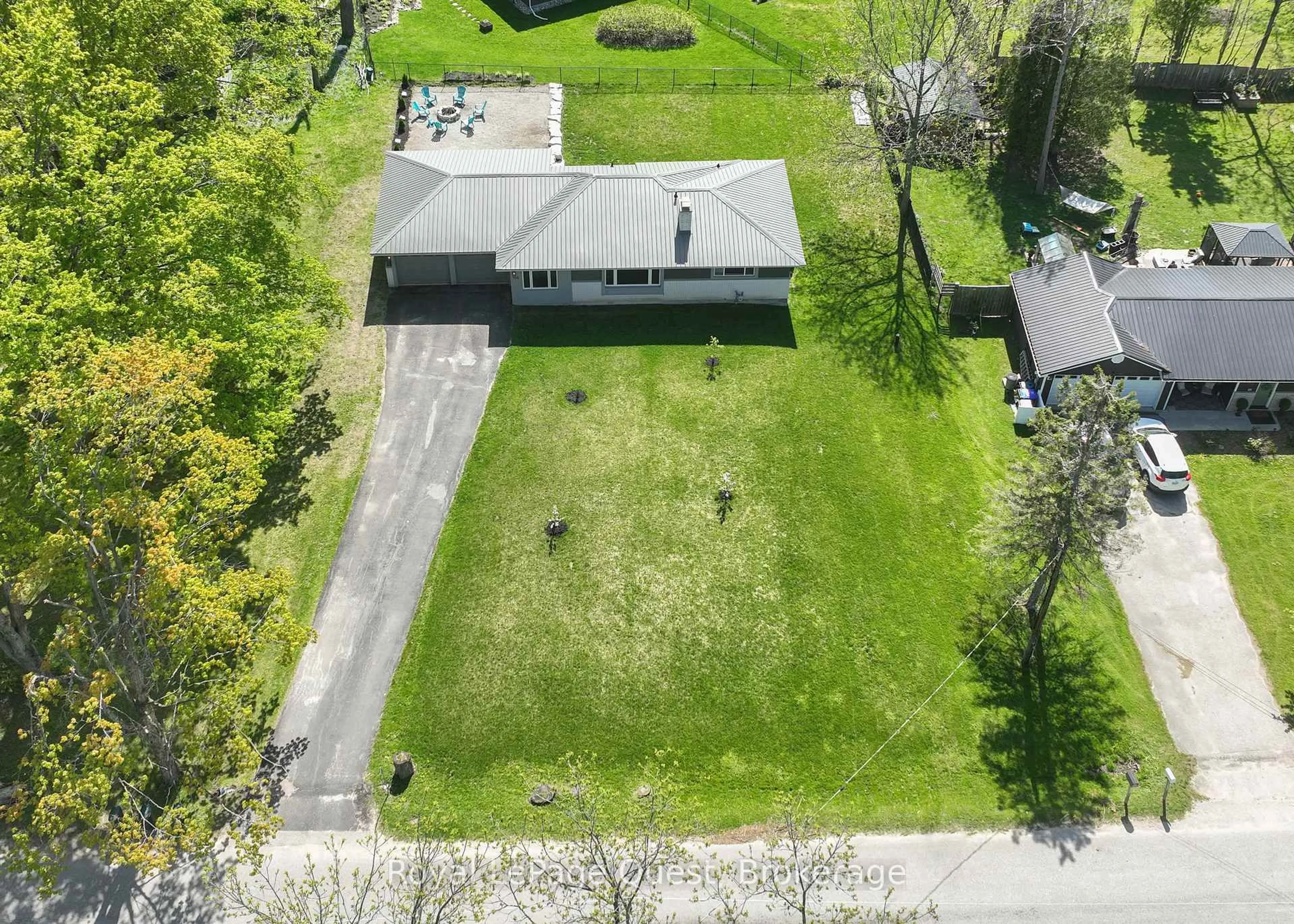 A pic from outside/outdoor area/front of a property/back of a property/a pic from drone, street for 138 Bass Line, Oro-Medonte Ontario L3V 0J9