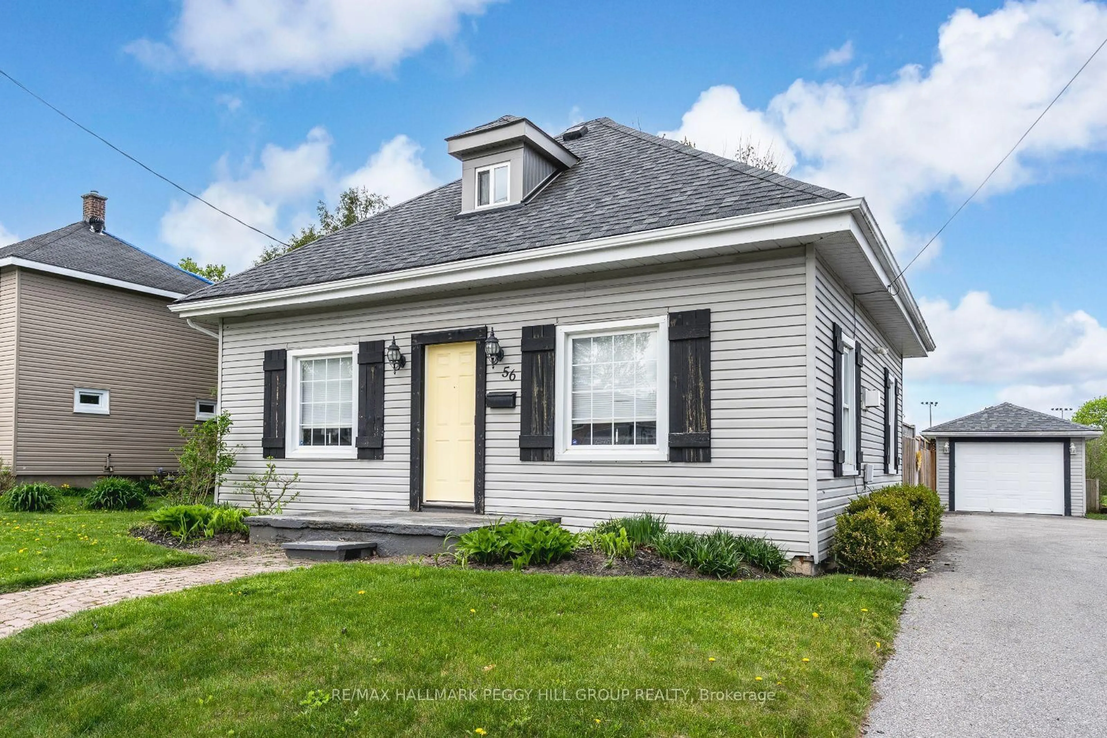 Home with vinyl exterior material, street for 56 Yonge St, Springwater Ontario L0L 1P0