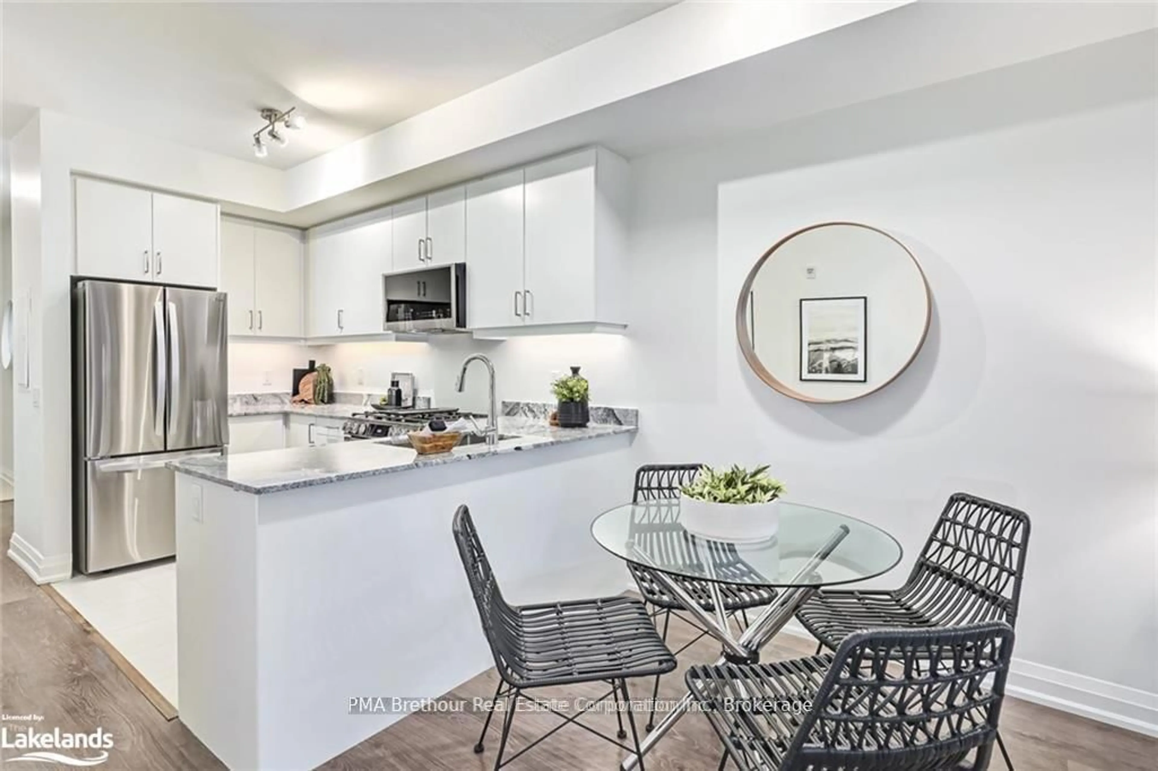 Open concept kitchen, ceramic/tile floor for 17 Spooner Cres #204, Collingwood Ontario L9Y 1T3
