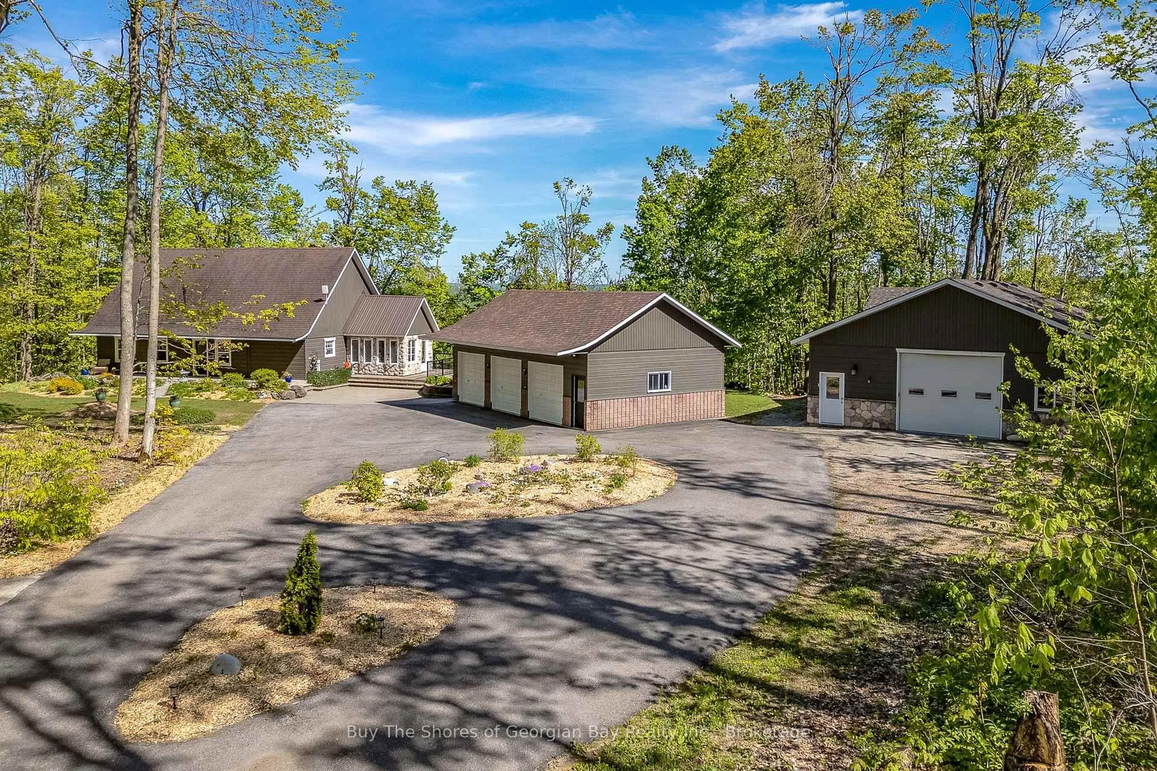 A pic from outside/outdoor area/front of a property/back of a property/a pic from drone, unknown for 691 Mount St. Louis Rd, Oro-Medonte Ontario L0L 1V0