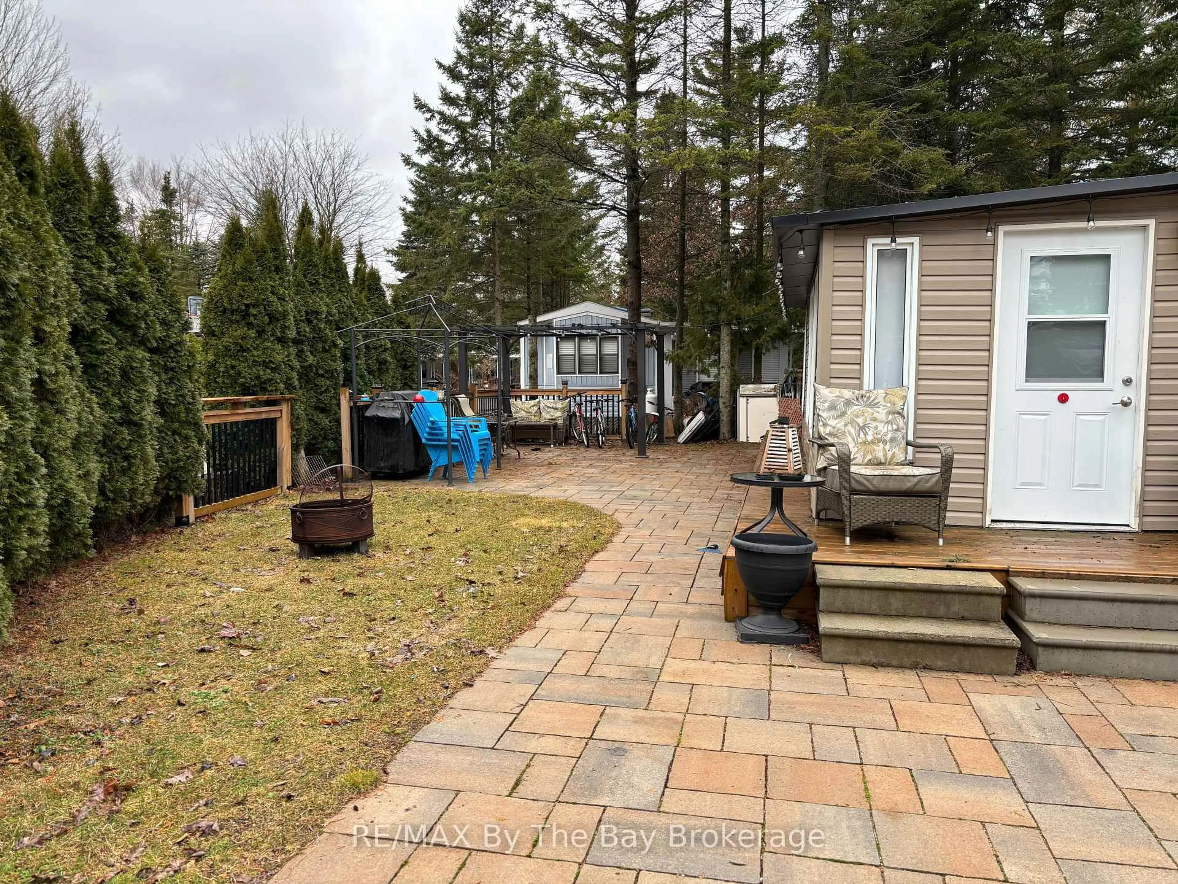 Patio, forest/trees view for 85 THEME PARK Dr #263, Wasaga Beach Ontario L9Z 1X7