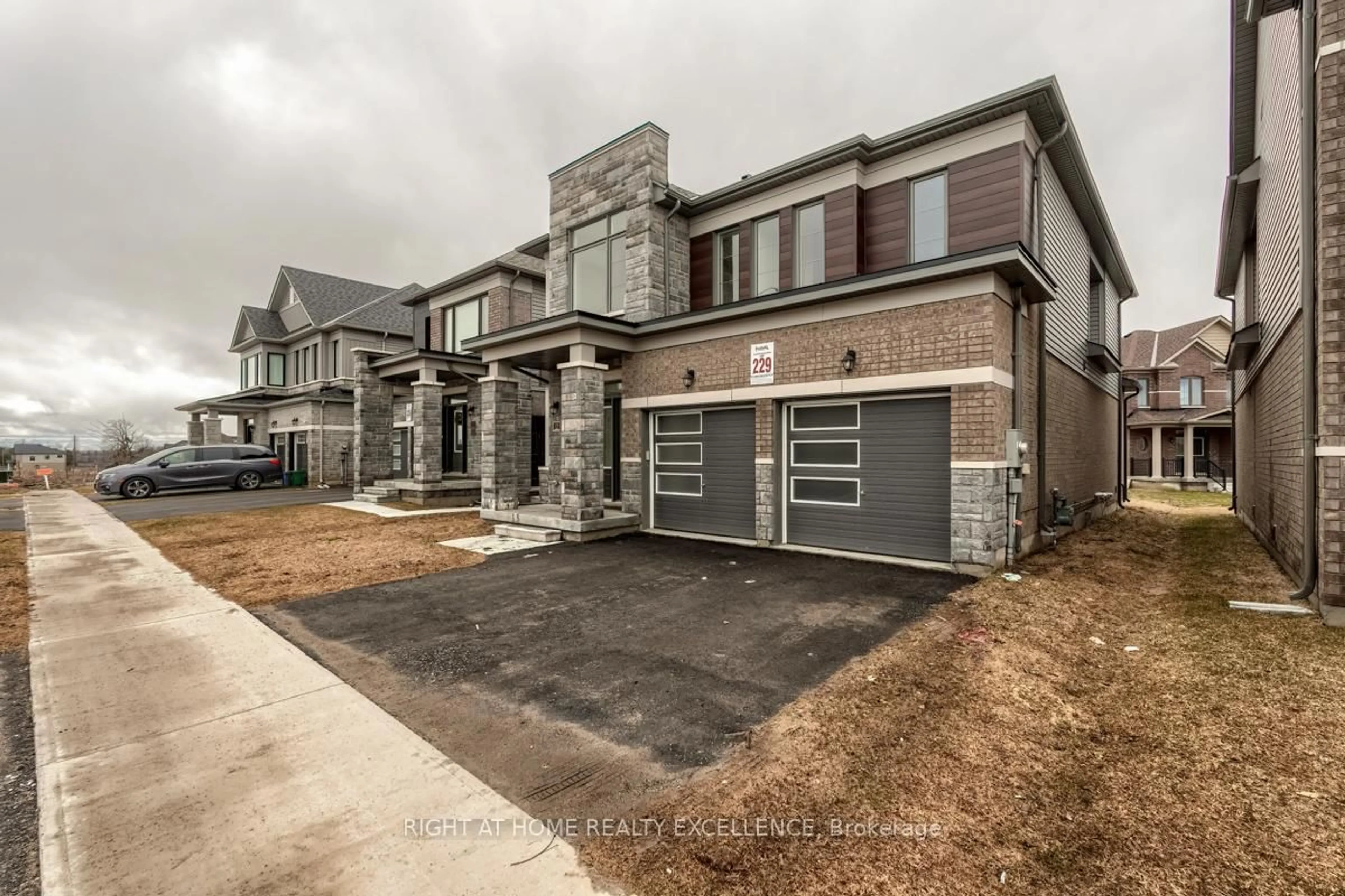 Home with brick exterior material, street for 73 Nottingham Rd, Barrie Ontario L9J 0L3