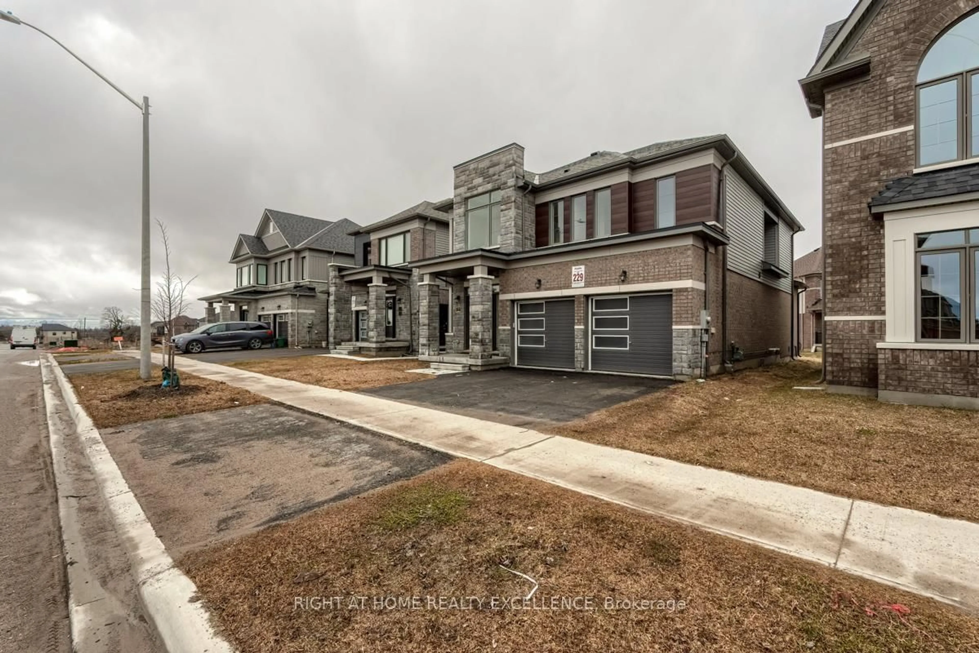 Home with brick exterior material, street for 73 Nottingham Rd, Barrie Ontario L9J 0L3