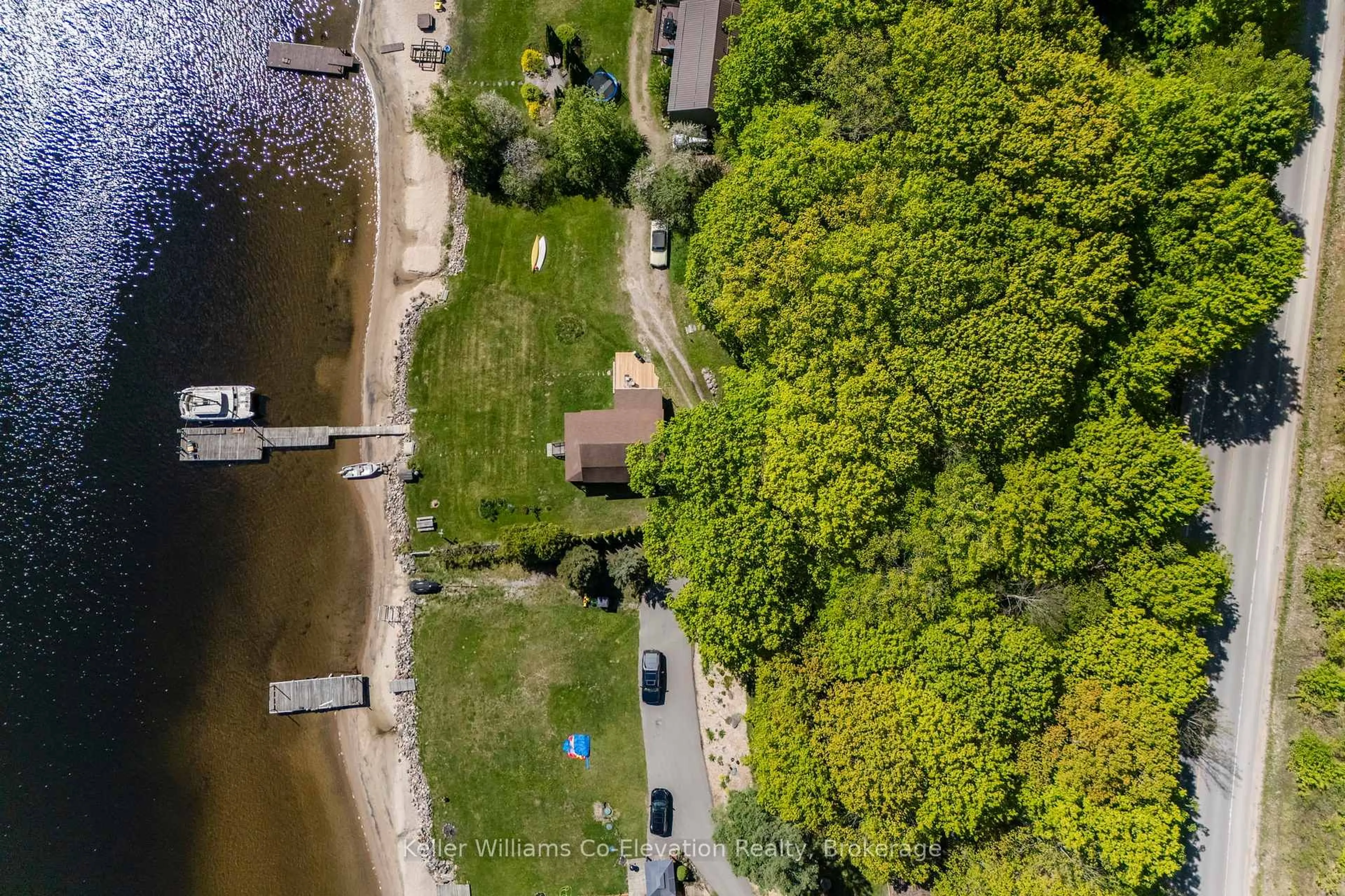 A pic from outside/outdoor area/front of a property/back of a property/a pic from drone, water/lake/river/ocean view for 437 Champlain Rd, Penetanguishene Ontario L9M 1S5